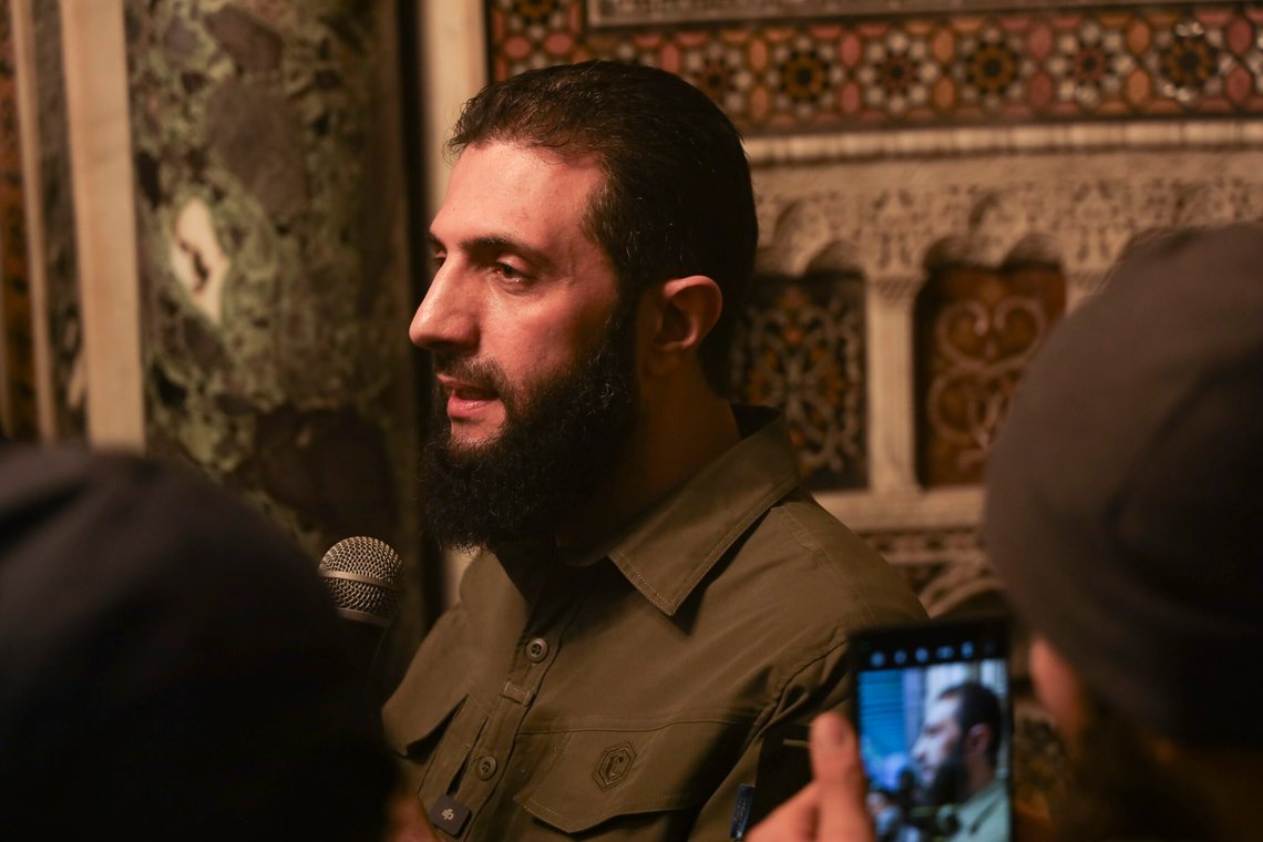 Abu Mohammed al-Golani speaks at the Umayyad Mosque in Damascus Sunday Dec. 8, 2024. Golani, a former al-Qaida commander who cut ties with the group and says he embraces pluralism and religious tolerance, leads the biggest rebel faction and is poised to chart the country's future. He calls himself by his given name, Ahmad al-Sharaa, and not his nom de guerre.(AP Photo/Omar Albam) Abu Mohammed al-Golani speaks at the Umayyad Mosque in Damascus Sunday Dec. 8, 2024. Golani, a former al-Qaida commander who cut ties with the group and says he embraces pluralism and religious tolerance, leads the biggest rebel faction and is poised to chart the country's future. He calls himself by his given name, Ahmad al-Sharaa, and not his nom de guerre.(AP Photo/Omar Albam)