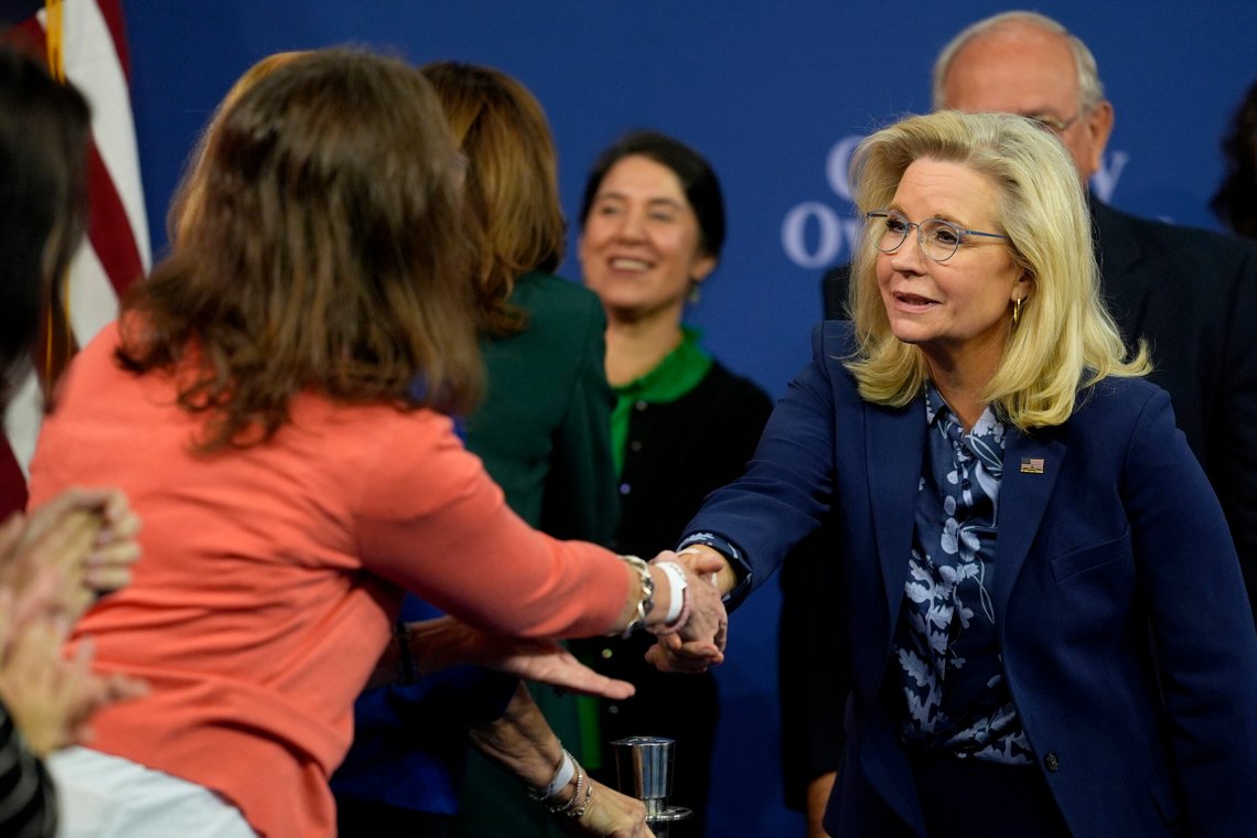Former Republican Congresswoman Liz Cheney greets a member of the audience as she departs a town hall with Democratic presidential nominee Vice President Kamala Harris at The People's Light in Malvern, Pa., Monday, Oct. 21, 2024. (AP Photo/Matt Rourke) Former Republican Congresswoman Liz Cheney greets a member of the audience as she departs a town hall with Democratic presidential nominee Vice President Kamala Harris at The People's Light in Malvern, Pa., Monday, Oct. 21, 2024. (AP Photo/Matt Rourke)