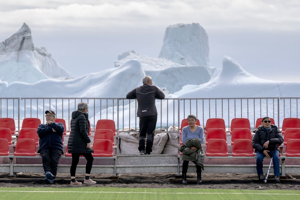 File Photo: Local residents on a sports field in the town of Qeqertarsuaq in Greenland, Sunday, June 30, 2024. The city is located on Disko Island, which is the country's largest island File Photo: Local residents on a sports field in the town of Qeqertarsuaq in Greenland, Sunday, June 30, 2024. The city is located on Disko Island, which is the country's largest island