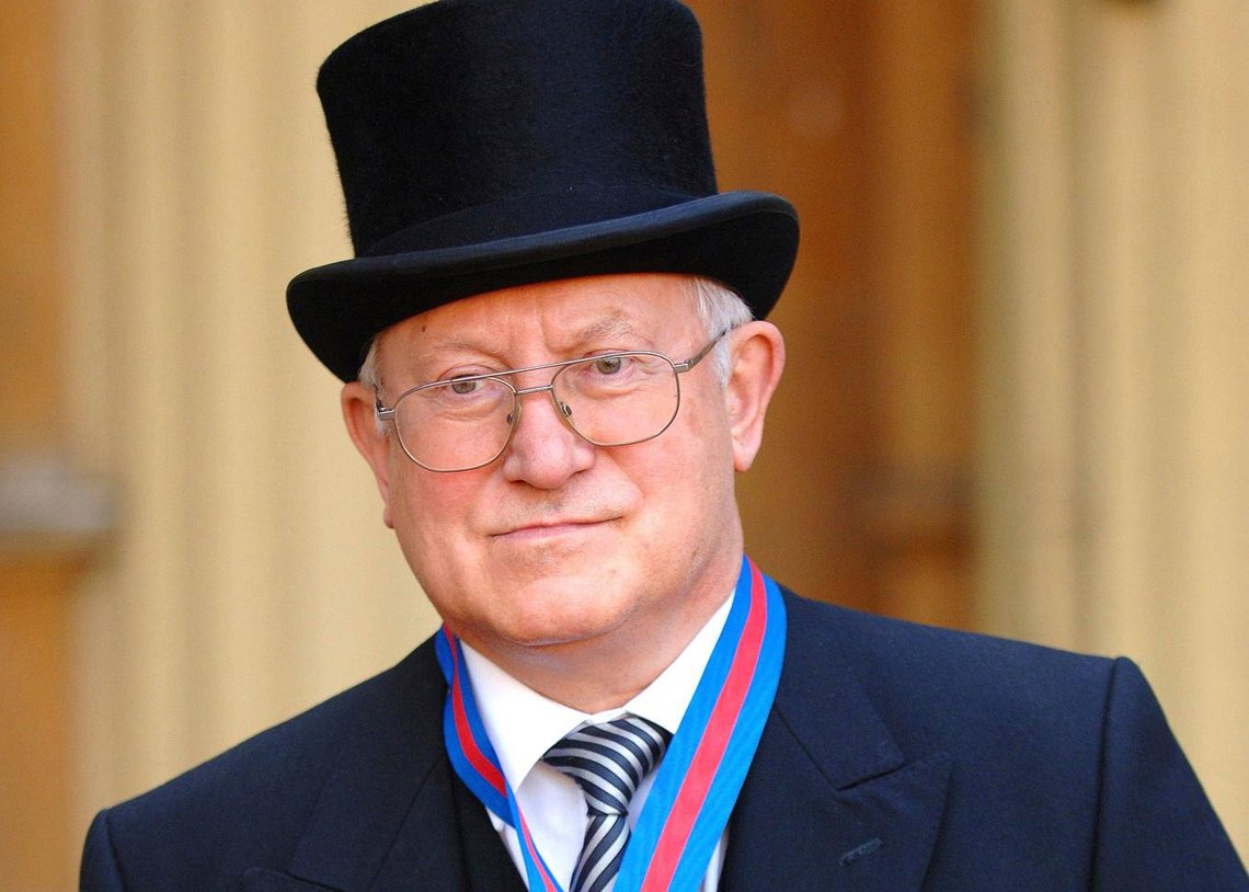 FILE- Former Soviet spy Oleg Gordievsky after receiving the Companion of the Most Distinguished Order of St Michael and Saint George from Queen Elizabeth II at Buckingham Palace in London, Oct. 17, 2007. (Fiona Hanson/PA via AP, file) FILE- Former Soviet spy Oleg Gordievsky after receiving the Companion of the Most Distinguished Order of St Michael and Saint George from Queen Elizabeth II at Buckingham Palace in London, Oct. 17, 2007. (Fiona Hanson/PA via AP, file)