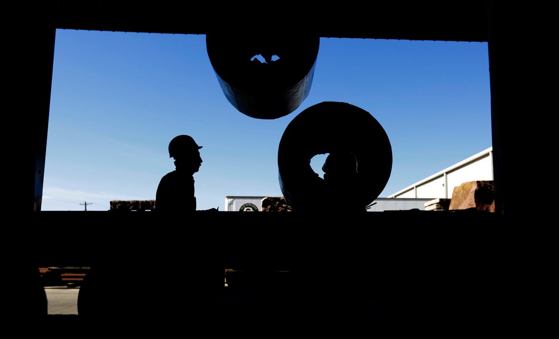 In this Monday, Nov. 21, 2016 photo, workers load rolls of sheet metal at LMS International in Laredo, Texas. Donald TrumpÄôs campaign promise to abandon the North American Free Trade Agreement helped win over Rust Belt voters who felt left behind by globalization. But U.S. border cities that have thrived under the trade pact - such as Laredo and El Paso in Texas, and Nogales in Arizona - now worry that an economic reckoning could be coming its way. (AP Photo/Eric Gay) In this Monday, Nov. 21, 2016 photo, workers load rolls of sheet metal at LMS International in Laredo, Texas. Donald TrumpÄôs campaign promise to abandon the North American Free Trade Agreement helped win over Rust Belt voters who felt left behind by globalization. But U.S. border cities that have thrived under the trade pact - such as Laredo and El Paso in Texas, and Nogales in Arizona - now worry that an economic reckoning could be coming its way. (AP Photo/Eric Gay)