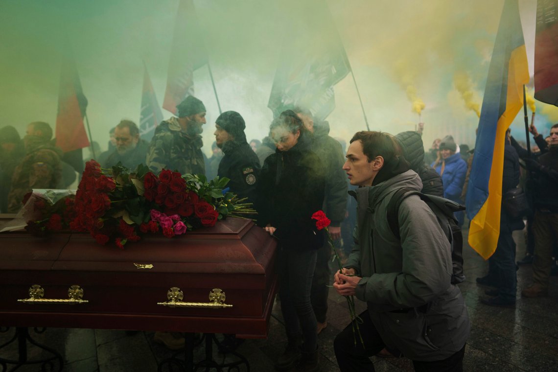 A man gives his last salute to a Ukrainian officer Pavlo Vedybida aka "Obolonchik" during funeral ceremony on Independence square in Kyiv, Ukraine, Saturday, Nov. 30, 2024. (AP Photo/Evgeniy Maloletka) A man gives his last salute to a Ukrainian officer Pavlo Vedybida aka "Obolonchik" during funeral ceremony on Independence square in Kyiv, Ukraine, Saturday, Nov. 30, 2024. (AP Photo/Evgeniy Maloletka)