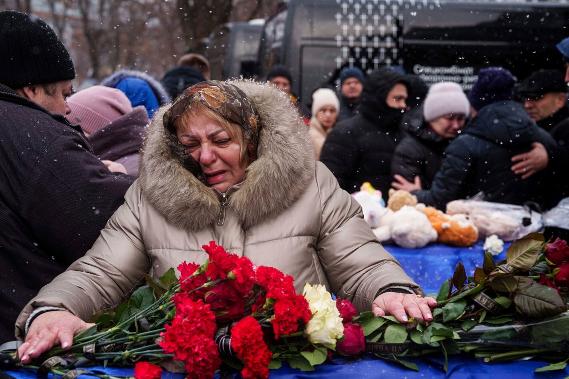 Relatives say goodbye to Dmytro Yavorskyi, 37, Sofia Yavorska, 9, Olena Yavorska 38, who were killed on Feb. 1 by a Russian strike on residential building during a funeral ceremony in Poltava, Ukraine, Wednesday, Feb. 5, 2025. (AP Photo/Evgeniy Maloletka) Relatives say goodbye to Dmytro Yavorskyi, 37, Sofia Yavorska, 9, Olena Yavorska 38, who were killed on Feb. 1 by a Russian strike on residential building during a funeral ceremony in Poltava, Ukraine, Wednesday, Feb. 5, 2025. (AP Photo/Evgeniy Maloletka)