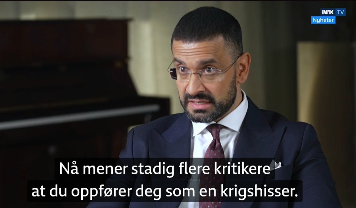 - Nå mener stadig flere kritikere at du oppfører deg som en krigshisser, sa NRKs Yama Wolasmal til jødiske Ervin Kohn i sitt nye innslag i serien Yama utfordrer. Skjermdump fra NRK. - Nå mener stadig flere kritikere at du oppfører deg som en krigshisser, sa NRKs Yama Wolasmal til jødiske Ervin Kohn i sitt nye innslag i serien Yama utfordrer. Skjermdump fra NRK.