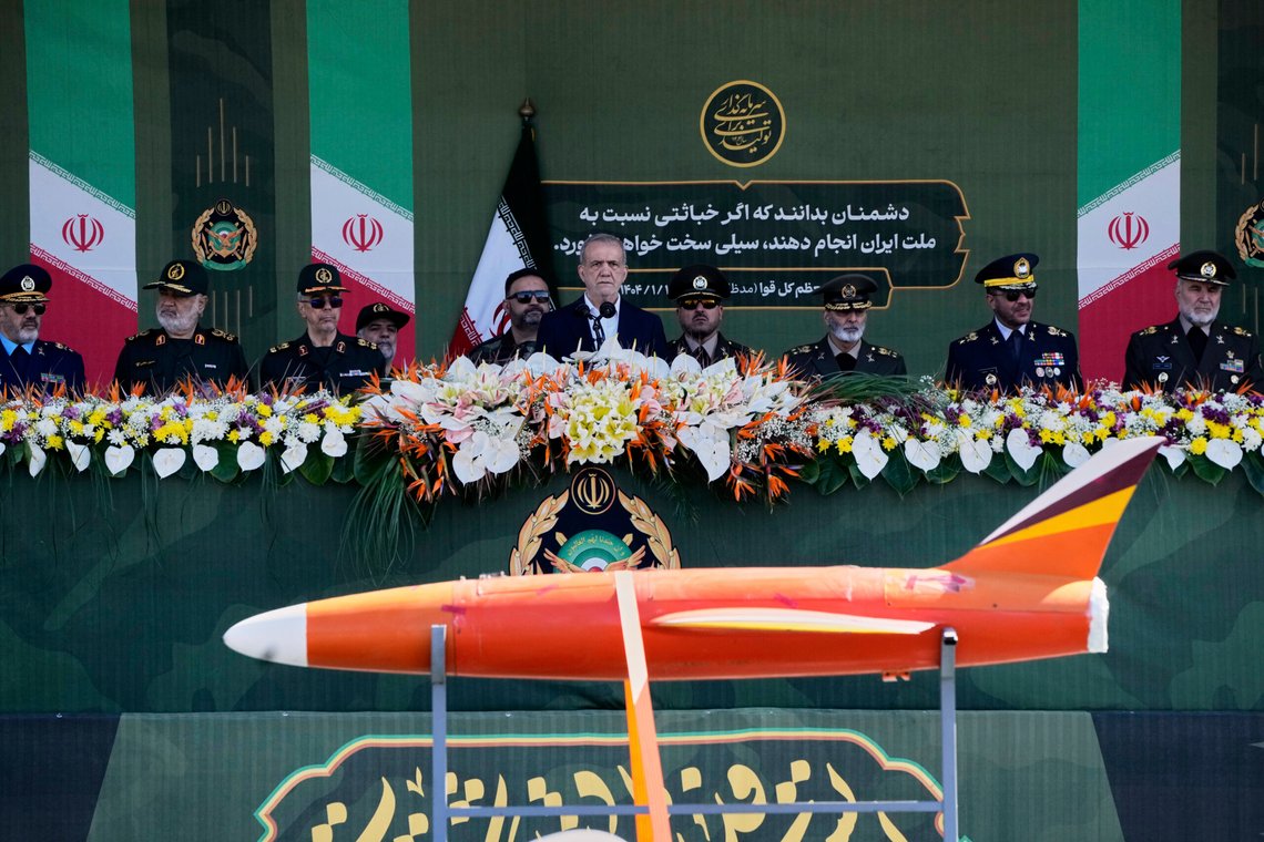 Iranian President Masoud Pezeshkian, center, reviews army's hardware as he is accompanied by armed forces commanders during the army parade commemorating National Army Day in front of the shrine of the late revolutionary founder Ayatollah Khomeini, just outside Tehran, Iran, Friday, April 18, 2025. (AP Photo/Vahid Salemi) Iranian President Masoud Pezeshkian, center, reviews army's hardware as he is accompanied by armed forces commanders during the army parade commemorating National Army Day in front of the shrine of the late revolutionary founder Ayatollah Khomeini, just outside Tehran, Iran, Friday, April 18, 2025. (AP Photo/Vahid Salemi)