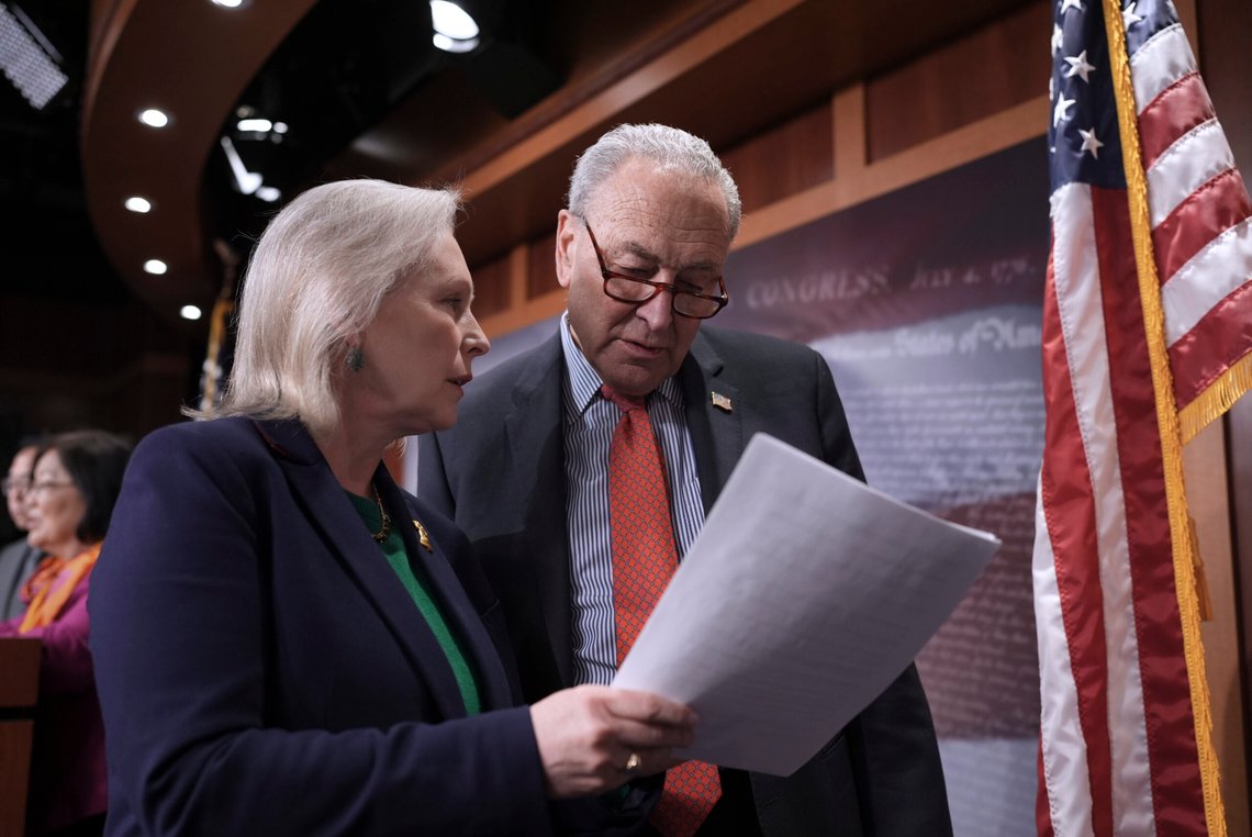 Sen. Kirsten Gillibrand, D-N.Y., left, confers with Senate Minority Leader Chuck Schumer, D-N.Y., before speaking to reporters after President Donald Trump announced a pause on his reciprocal tariffs for 90 days with the exception of China, at the Capitol in Washington, Wednesday, April 9, 2025. (AP Photo/J. Scott Applewhite) Sen. Kirsten Gillibrand, D-N.Y., left, confers with Senate Minority Leader Chuck Schumer, D-N.Y., before speaking to reporters after President Donald Trump announced a pause on his reciprocal tariffs for 90 days with the exception of China, at the Capitol in Washington, Wednesday, April 9, 2025. (AP Photo/J. Scott Applewhite)