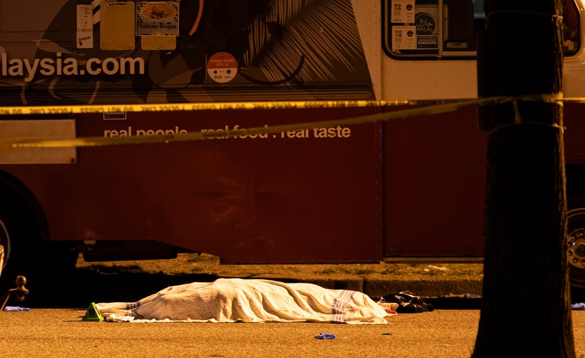 A victim covered with a cloth lies near a food truck after a car drove into a crowd at the Lapu Lapu Festival in Vancouver, British Columbia, Saturday, April 26, 2025. (Rich Lam/The Canadian Press via AP) A victim covered with a cloth lies near a food truck after a car drove into a crowd at the Lapu Lapu Festival in Vancouver, British Columbia, Saturday, April 26, 2025. (Rich Lam/The Canadian Press via AP)