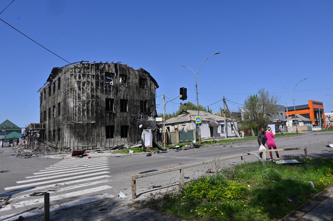 Local residents walk past damaged buildings in central Pokrovsk, the site of the heaviest battles with the Russian troops in the Donetsk region, Ukraine, Wednesday, April 23, 2025. (AP Photo/Michael Shtekel) Local residents walk past damaged buildings in central Pokrovsk, the site of the heaviest battles with the Russian troops in the Donetsk region, Ukraine, Wednesday, April 23, 2025. (AP Photo/Michael Shtekel)