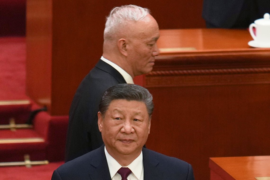 Chinese Politburo Standing Committee member Cai Qi, behind, walks past Chinese President Xi Jinping as they arrive for the closing ceremony of the National People's Congress held at the Great Hall of the People in Beijing, Tuesday, March 11, 2025. (AP Photo/Ng Han Guan) Chinese Politburo Standing Committee member Cai Qi, behind, walks past Chinese President Xi Jinping as they arrive for the closing ceremony of the National People's Congress held at the Great Hall of the People in Beijing, Tuesday, March 11, 2025. (AP Photo/Ng Han Guan)