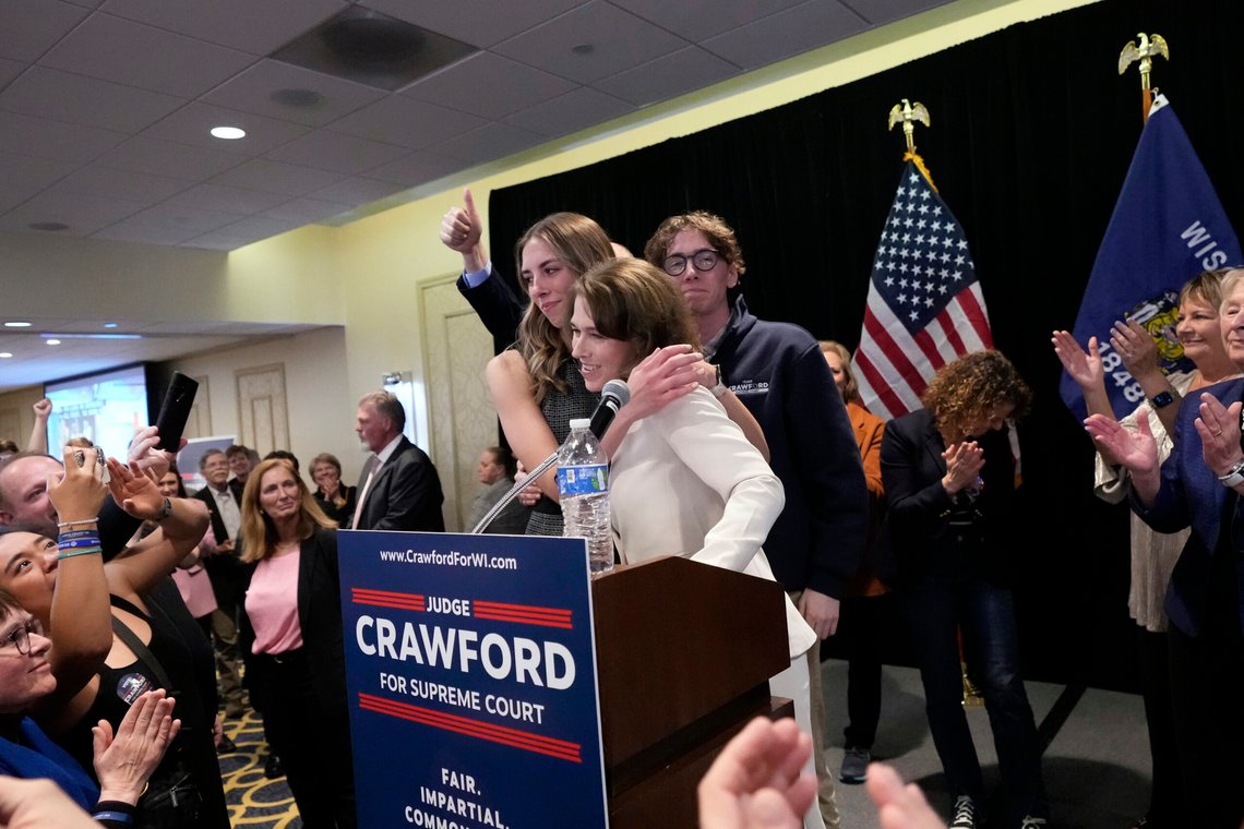 Wisconsin Supreme Court candidate Susan Crawford, center, hugs her daughter Maisie Peters, left, during Crawford's election night party after winning the election Tuesday, April 1, 2025, in Madison, Wis. (AP Photo/Kayla Wolf) Wisconsin Supreme Court candidate Susan Crawford, center, hugs her daughter Maisie Peters, left, during Crawford's election night party after winning the election Tuesday, April 1, 2025, in Madison, Wis. (AP Photo/Kayla Wolf)