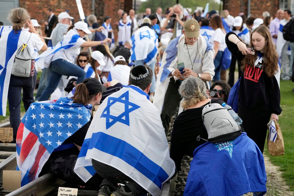 People attend the "March of the Living", the annual Holocaust remembrance event in memory of the six million Holocaust victims, at the former Nazi German death camp of Auschwitz-Birkenau in Oswiecim, Poland, Thursday, April 24, 2025. (AP Photo/Czarek Sokolowski) People attend the "March of the Living", the annual Holocaust remembrance event in memory of the six million Holocaust victims, at the former Nazi German death camp of Auschwitz-Birkenau in Oswiecim, Poland, Thursday, April 24, 2025. (AP Photo/Czarek Sokolowski)