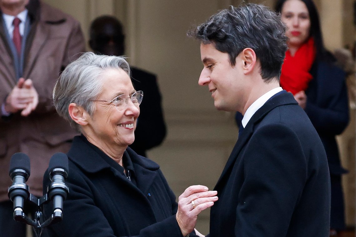 New French prime minister Gabriel Attal, right, smiles to outgoing prime minister Elisabeth Borne after the handover ceremony, Tuesday, Jan. 9, 2024 in Paris. Gabriel Attal was named as France's youngest-ever prime minister, as President Emmanuel Macron seeks a fresh start for the rest of his term amid growing political pressure from the far right. (Ludovic Marin, Pool via AP) New French prime minister Gabriel Attal, right, smiles to outgoing prime minister Elisabeth Borne after the handover ceremony, Tuesday, Jan. 9, 2024 in Paris. Gabriel Attal was named as France's youngest-ever prime minister, as President Emmanuel Macron seeks a fresh start for the rest of his term amid growing political pressure from the far right. (Ludovic Marin, Pool via AP)