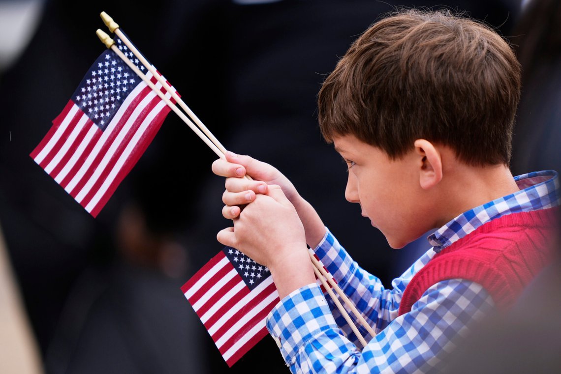 A boy looks at American flags before President Donald Trump arrives to deliver the Memorial Day Address at the 157th National Memorial Day Observance at Arlington National Cemetery, Monday, May 26, 2025, in Arlington, Va. (AP Photo/Julia Demaree Nikhinson) A boy looks at American flags before President Donald Trump arrives to deliver the Memorial Day Address at the 157th National Memorial Day Observance at Arlington National Cemetery, Monday, May 26, 2025, in Arlington, Va. (AP Photo/Julia Demaree Nikhinson)