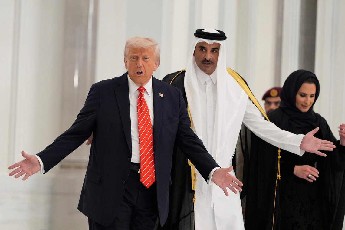 President Donald Trump and Qatar's Emir Sheikh Tamim bin Hamad Al Thani gesture during a state dinner at Lusail Palace in Doha, Qatar, Wednesday, May 14, 2025. (AP Photo/Alex Brandon) President Donald Trump and Qatar's Emir Sheikh Tamim bin Hamad Al Thani gesture during a state dinner at Lusail Palace in Doha, Qatar, Wednesday, May 14, 2025. (AP Photo/Alex Brandon)