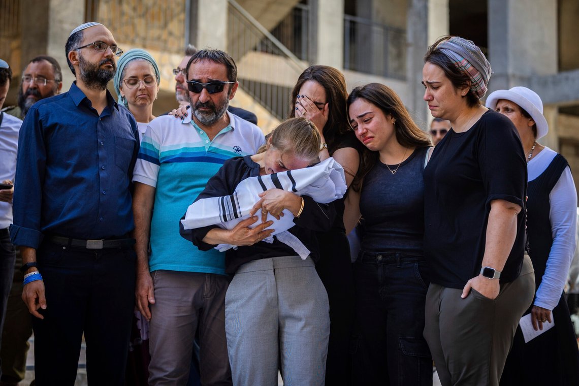 Relatives mourn as they hold the body of two-week-old Israeli infant Ravid Haim, who was delivered after his mother, Tzeela Gez, was shot and killed by a Palestinian gunman in the West Bank while en route to the hospital with her husband to give birth, in Jerusalem, Thursday, May 29, 2025. (AP Photo/Oren Ben Hakoon) Relatives mourn as they hold the body of two-week-old Israeli infant Ravid Haim, who was delivered after his mother, Tzeela Gez, was shot and killed by a Palestinian gunman in the West Bank while en route to the hospital with her husband to give birth, in Jerusalem, Thursday, May 29, 2025. (AP Photo/Oren Ben Hakoon)