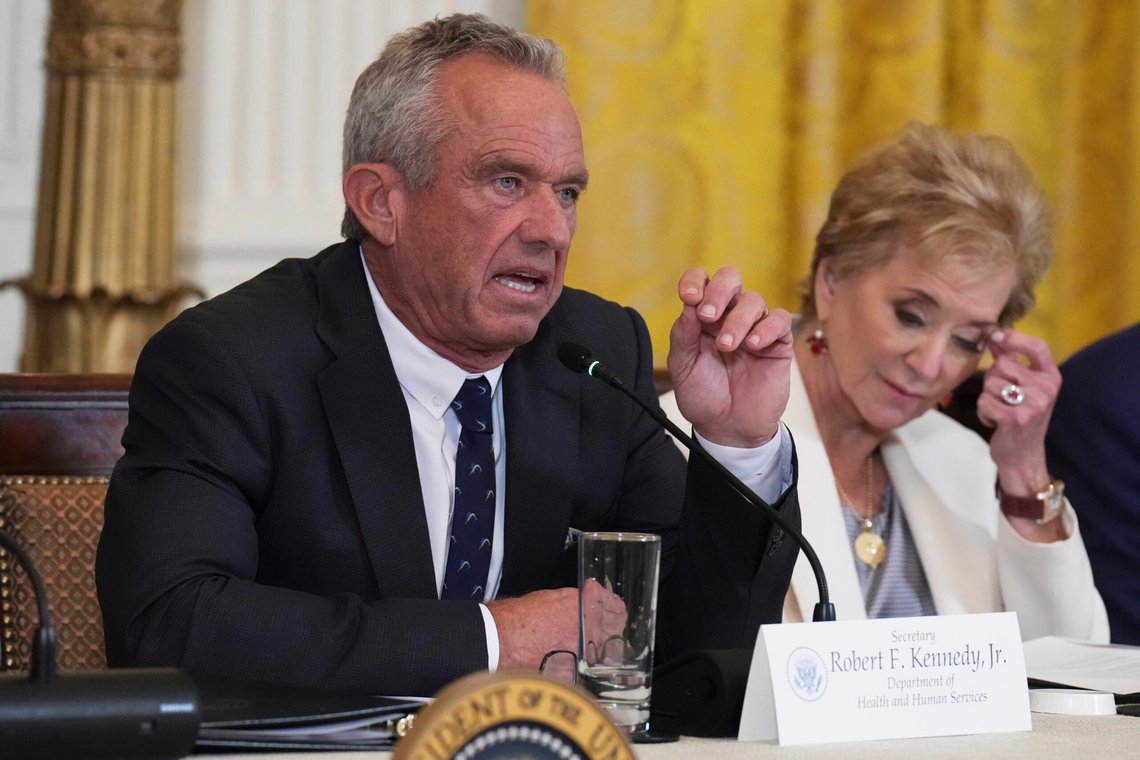 Health and Human Services Secretary Robert F. Kennedy Jr. speaks as Education Secretary Linda McMahon listens during a Make America Healthy Again (MAHA) Commission Event in the East Room of the White House, Thursday, May 22, 2025, in Washington. (AP Photo/Jacquelyn Martin) Health and Human Services Secretary Robert F. Kennedy Jr. speaks as Education Secretary Linda McMahon listens during a Make America Healthy Again (MAHA) Commission Event in the East Room of the White House, Thursday, May 22, 2025, in Washington. (AP Photo/Jacquelyn Martin)