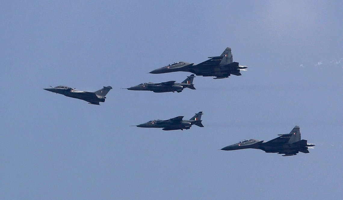 A French-made Rafale fighter jet, left, flies accompanied by Jaguars, center and Sukhois behind during its induction ceremony at the Indian Air Force Station in Ambala, India, Thursday, Sept.10, 2020. The first batch of five planes, part of a $8.78 billion deal signed between the two countries in 2016 had arrived here in July. (AP Photo/Manish Swarup) A French-made Rafale fighter jet, left, flies accompanied by Jaguars, center and Sukhois behind during its induction ceremony at the Indian Air Force Station in Ambala, India, Thursday, Sept.10, 2020. The first batch of five planes, part of a $8.78 billion deal signed between the two countries in 2016 had arrived here in July. (AP Photo/Manish Swarup)