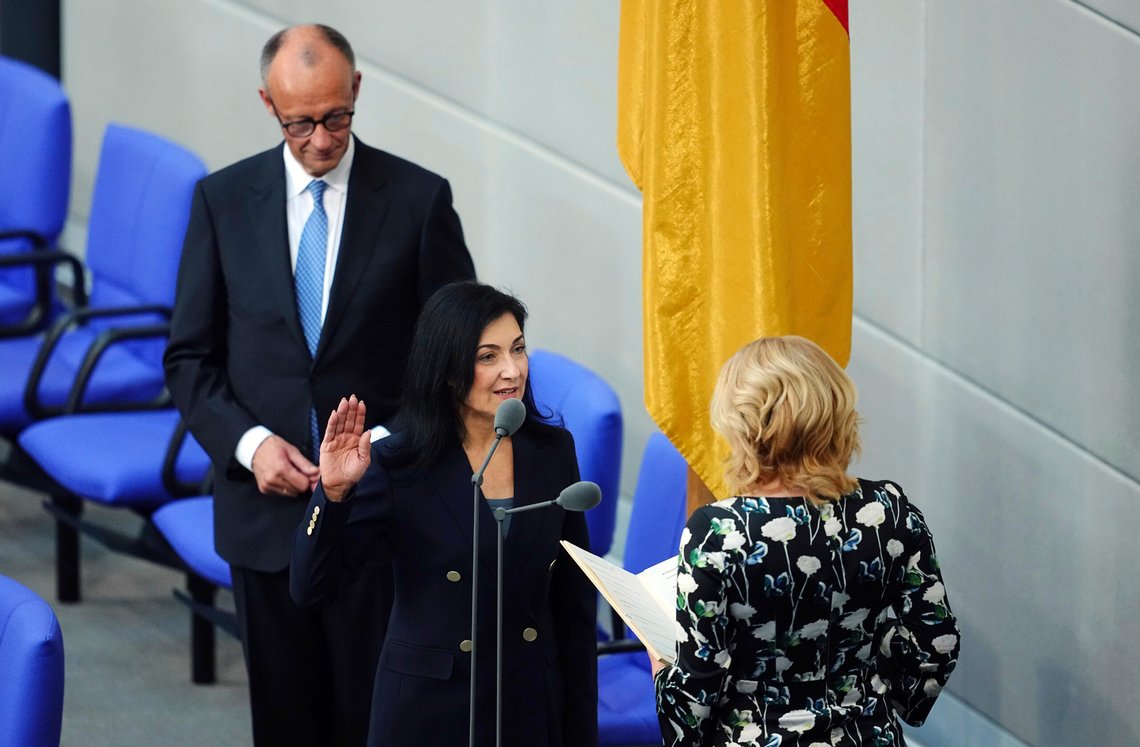 Katherina Reiche (CDU), Federal Minister for Economic Affairs and Energy, takes the oath of office in the Bundestag in the presence of Federal Chancellor Friedrich Merz (CDU), left, before Bundestag President Julia Kloeckner (CDU), right, at the swearing-in ceremony at the Bundestag in Berlin, Tuesday, May 6, 2025. (Kay Nietfeld/dpa via AP) Katherina Reiche (CDU), Federal Minister for Economic Affairs and Energy, takes the oath of office in the Bundestag in the presence of Federal Chancellor Friedrich Merz (CDU), left, before Bundestag President Julia Kloeckner (CDU), right, at the swearing-in ceremony at the Bundestag in Berlin, Tuesday, May 6, 2025. (Kay Nietfeld/dpa via AP)