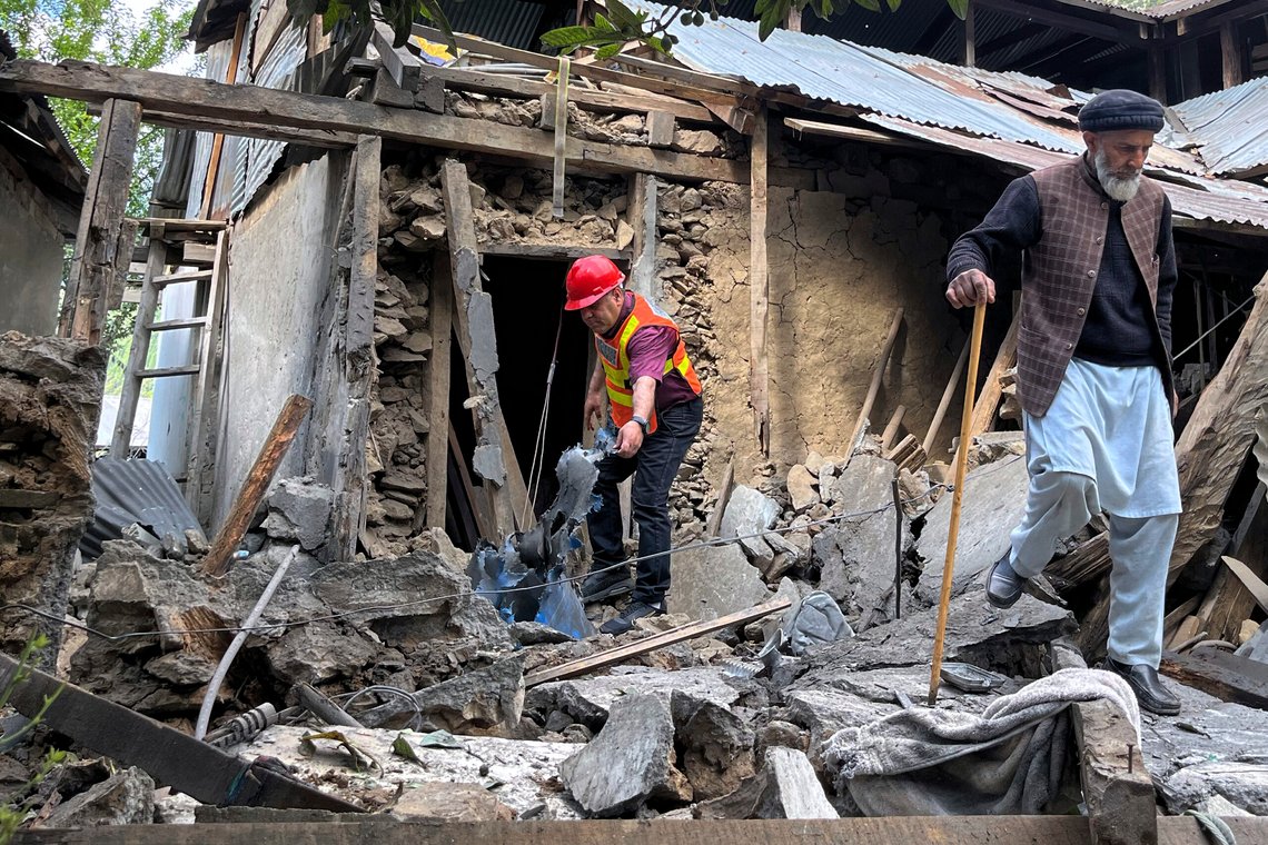 A Kashmiri villager and a rescue worker examine damages to a house caused by overnight Indian shelling, in Shah Kot, in Neelum Vallery, a district of Pakistan's administered Kashmir, Saturday, May 10, 2025. (AP Photo/M.D. Mughal) A Kashmiri villager and a rescue worker examine damages to a house caused by overnight Indian shelling, in Shah Kot, in Neelum Vallery, a district of Pakistan's administered Kashmir, Saturday, May 10, 2025. (AP Photo/M.D. Mughal)