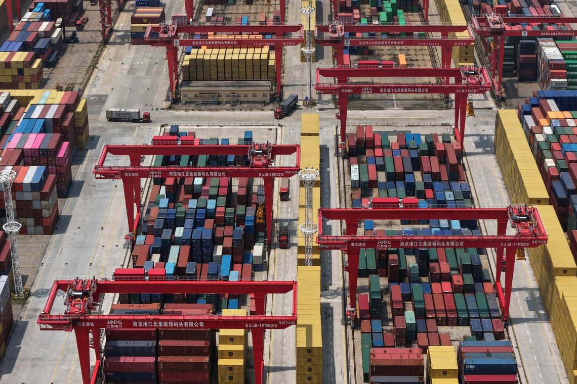 Trucks move through containers piled up at a container terminal in Nanjing in east China's Jiangsu province on June 3, 2025. (Chinatopix Via AP) Trucks move through containers piled up at a container terminal in Nanjing in east China's Jiangsu province on June 3, 2025. (Chinatopix Via AP)