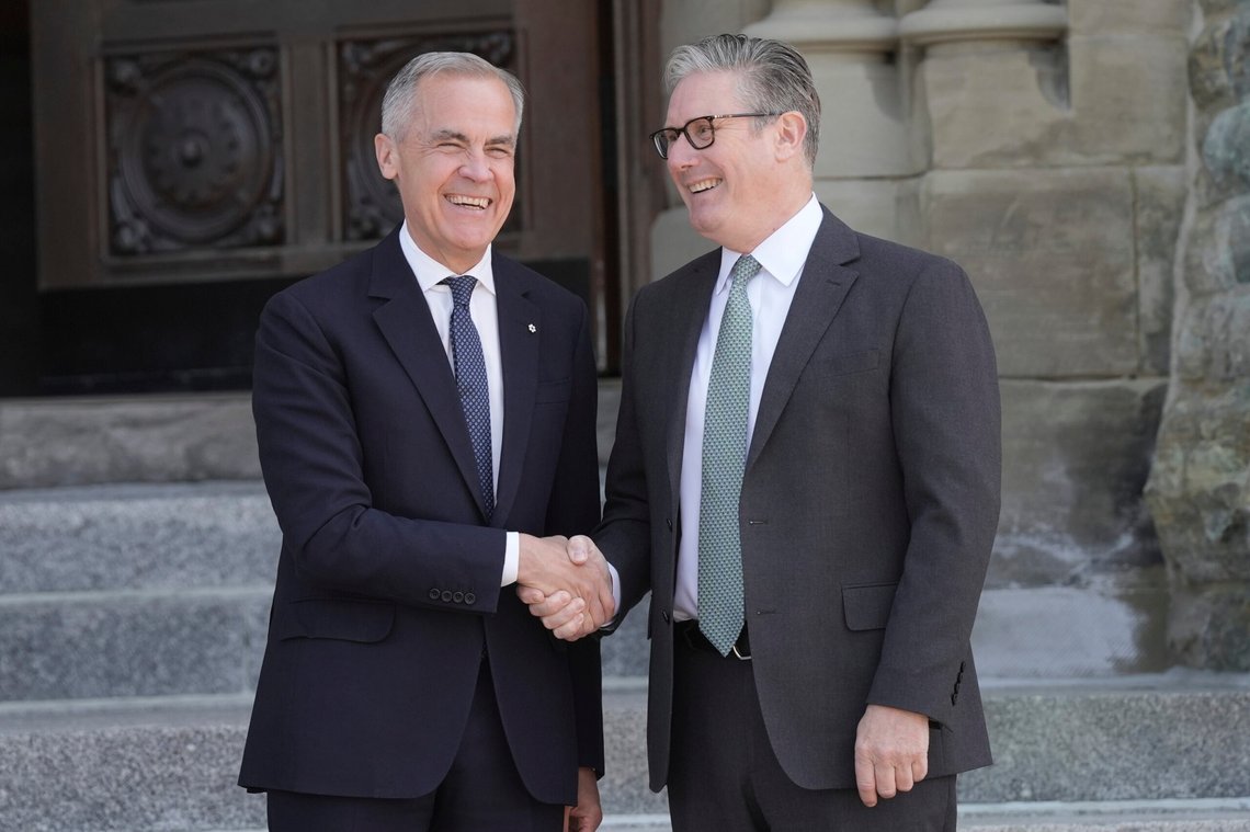 Prime Minister of Canada Mark Carney, left, welcomes Britain's Prime Minister Keir Starmer to Parliament Hill, Ottawa, Canada, Sunday June 15, 2025, ahead of the G7 summit leaders' summit. (Stefan Rousseau/Pool Photo via AP) Prime Minister of Canada Mark Carney, left, welcomes Britain's Prime Minister Keir Starmer to Parliament Hill, Ottawa, Canada, Sunday June 15, 2025, ahead of the G7 summit leaders' summit. (Stefan Rousseau/Pool Photo via AP)