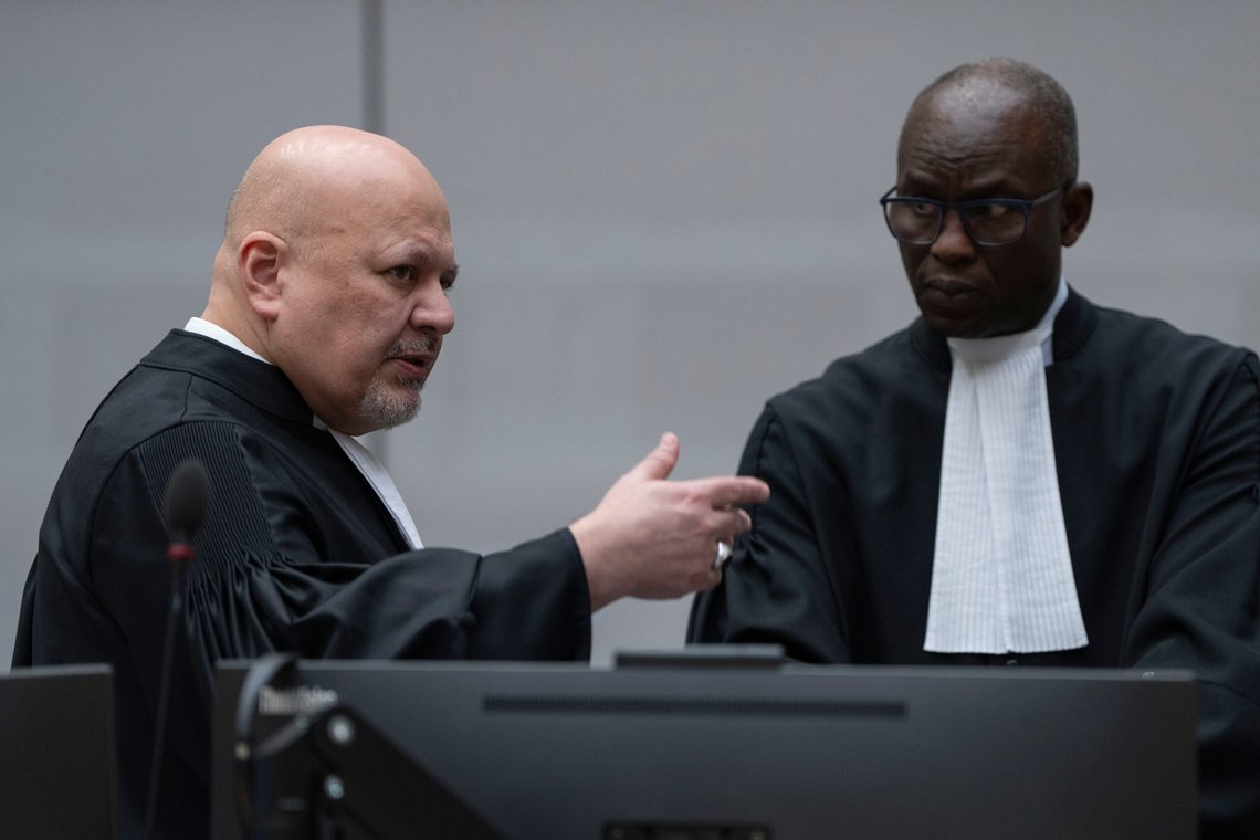 Chief Prosecutor Karim Khan, left, talks to Deputy Prosecutor Mame Mandiaye Niang as they wait for former Philippine President Rodrigo Duterte to appear via video link before the International Criminal Court (ICC) in The Hague, Netherlands, Friday, March 14, 2025. (AP Photo/Peter Dejong, Pool) Chief Prosecutor Karim Khan, left, talks to Deputy Prosecutor Mame Mandiaye Niang as they wait for former Philippine President Rodrigo Duterte to appear via video link before the International Criminal Court (ICC) in The Hague, Netherlands, Friday, March 14, 2025. (AP Photo/Peter Dejong, Pool)