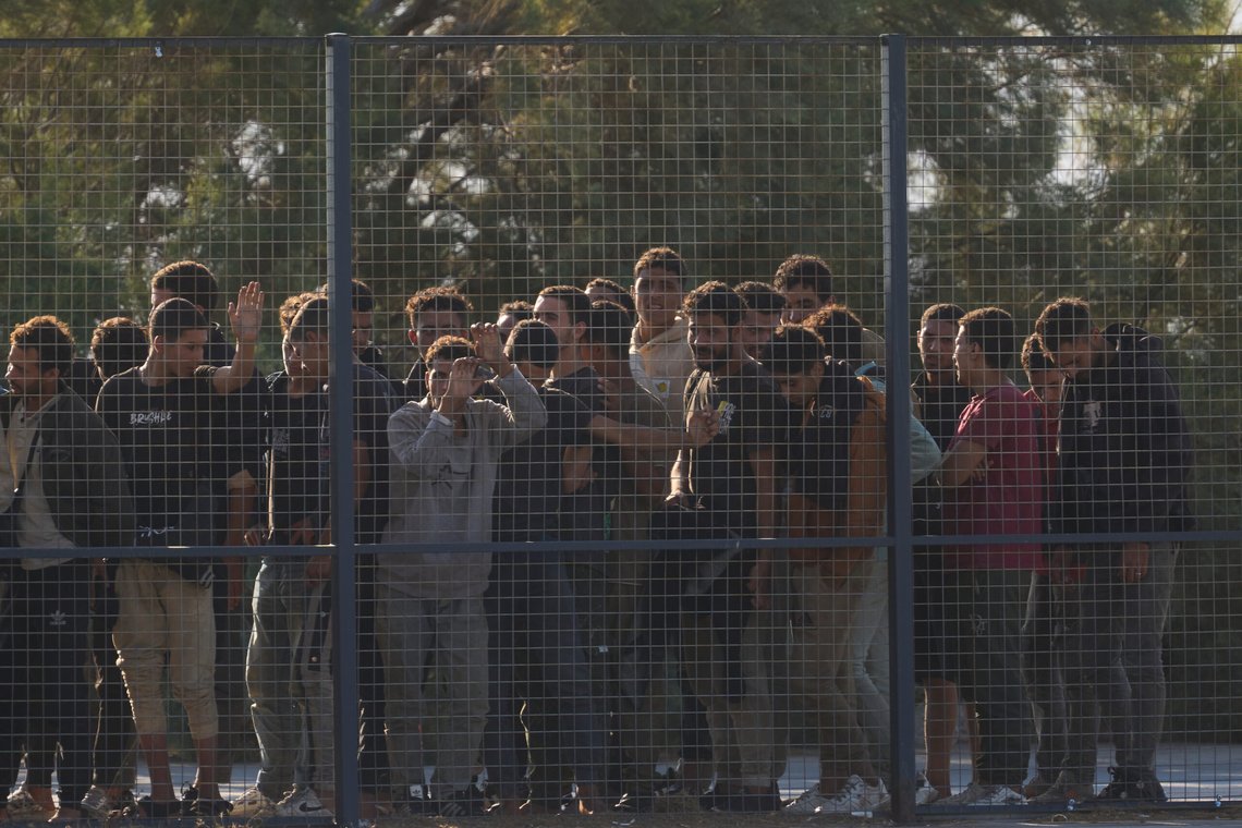 Migrants rescued south of Crete wait to be registered on their arrival at the the port of Lavrio, Greece, on Thursday, July 10, 2025. (AP Photo/Petros Giannakouris) Migrants rescued south of Crete wait to be registered on their arrival at the the port of Lavrio, Greece, on Thursday, July 10, 2025. (AP Photo/Petros Giannakouris)
