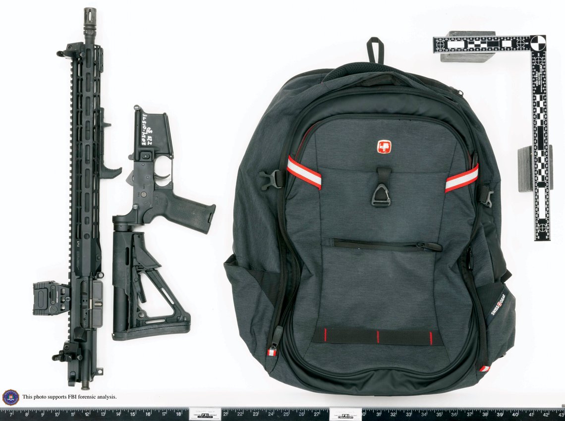 This image provided by the FBI shows Thomas Matthew Crooks' rifle broken down as was likely done for transport and the backpack recovered at the scene in Butler, Pa., July 13, 2024. Crooks searched online for events of both former President Donald Trump and President Joe Biden and saw the Pennsylvania campaign rally where he opened fire as a "target of opportunity," a senior FBI official said. (FBI via AP) This image provided by the FBI shows Thomas Matthew Crooks' rifle broken down as was likely done for transport and the backpack recovered at the scene in Butler, Pa., July 13, 2024. Crooks searched online for events of both former President Donald Trump and President Joe Biden and saw the Pennsylvania campaign rally where he opened fire as a "target of opportunity," a senior FBI official said. (FBI via AP)