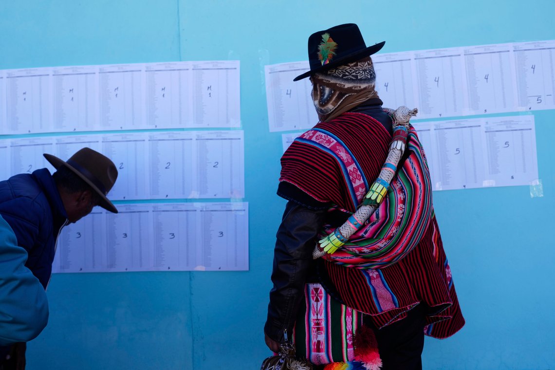 Voters check electoral rolls during general elections in Jesus de Machaca, Bolivia, Sunday, Aug. 17, 2025. (AP Photo/Juan Karita) Voters check electoral rolls during general elections in Jesus de Machaca, Bolivia, Sunday, Aug. 17, 2025. (AP Photo/Juan Karita)