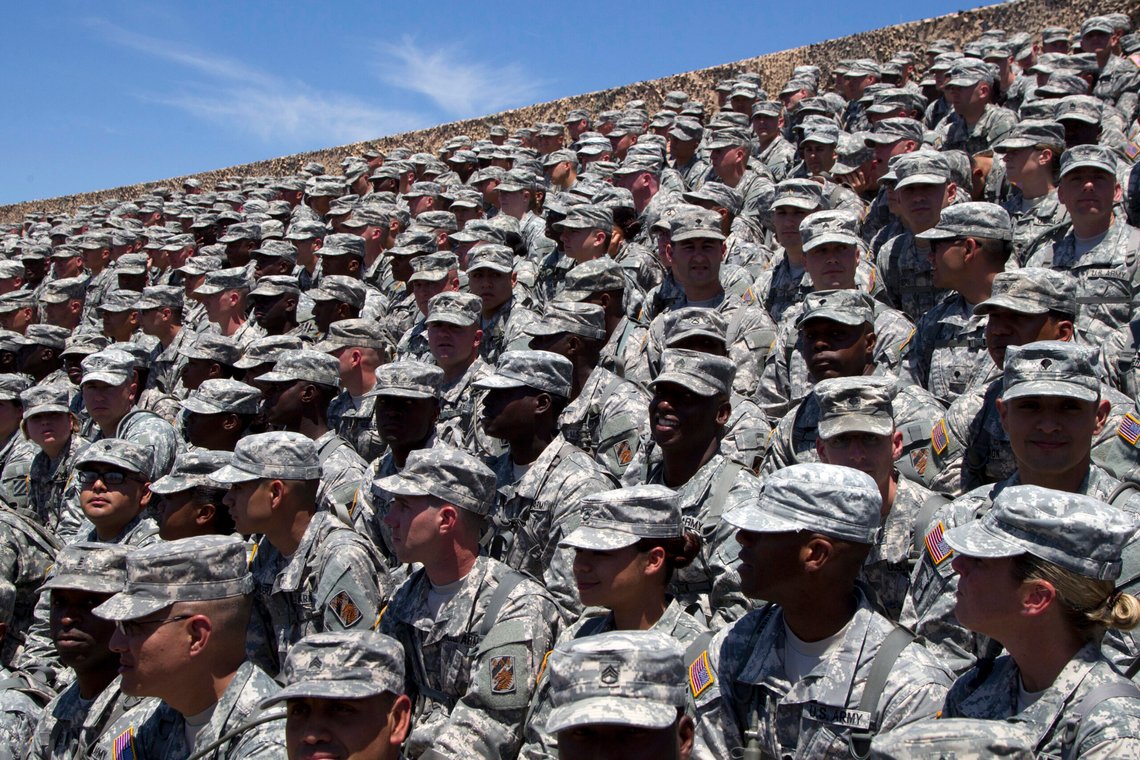 File - Troops wait for President Barack Obama to arrive at the Third Infantry Division Headquarters, on April 27, 2012, at Fort Stewart, Ga. Among health-related efforts is a pilot project involving the entire Third Infantry Division — more than 13,000 soldiers. Tracking soldiers' physical fitness, predictive modeling and AI are used to reduce injuries and increase performance (AP Photo/Carolyn Kaster, File) File - Troops wait for President Barack Obama to arrive at the Third Infantry Division Headquarters, on April 27, 2012, at Fort Stewart, Ga. Among health-related efforts is a pilot project involving the entire Third Infantry Division — more than 13,000 soldiers. Tracking soldiers' physical fitness, predictive modeling and AI are used to reduce injuries and increase performance (AP Photo/Carolyn Kaster, File)