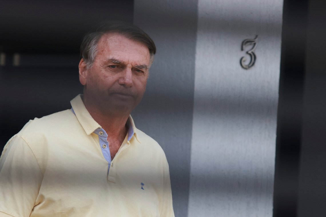 Brazil's former President Jair Bolsonaro stands behind the entrance gate of his home where he is under house arrest in Brasilia, Brazil, Wednesday, Sept. 3, 2025. (AP Photo/Luis Nova) Brazil's former President Jair Bolsonaro stands behind the entrance gate of his home where he is under house arrest in Brasilia, Brazil, Wednesday, Sept. 3, 2025. (AP Photo/Luis Nova)