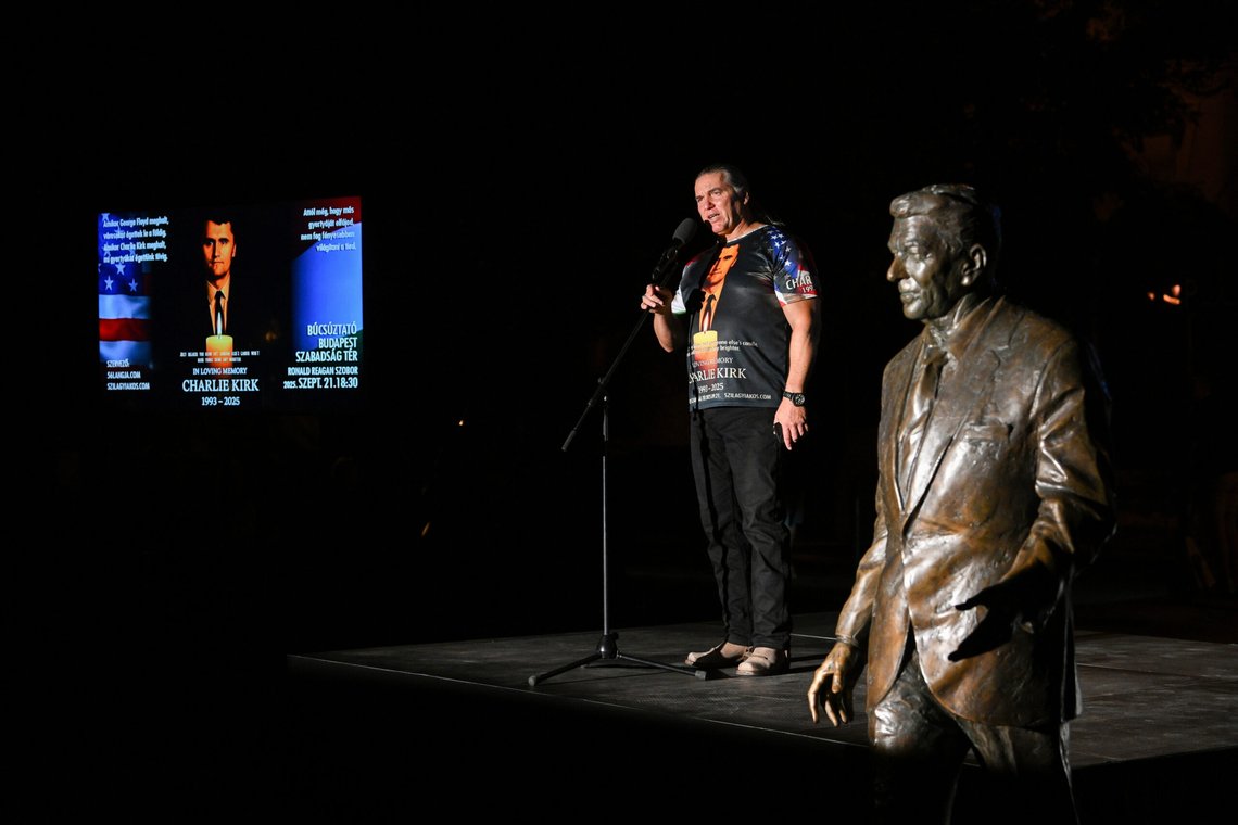 Event organiser Akos Szilagyi speaks during a commemoration of U. S. conservative political activist Charlie Kirk, who was shot and killed on Sept. 10, during a public debate at a Utah college, at the bronze sculpture of former U. S. president Ronald Reagan in Budapest, Hungary, Sunday, Sept. 21, 2025. (Szilard Koszticsak/MTI via AP) Event organiser Akos Szilagyi speaks during a commemoration of U. S. conservative political activist Charlie Kirk, who was shot and killed on Sept. 10, during a public debate at a Utah college, at the bronze sculpture of former U. S. president Ronald Reagan in Budapest, Hungary, Sunday, Sept. 21, 2025. (Szilard Koszticsak/MTI via AP)
