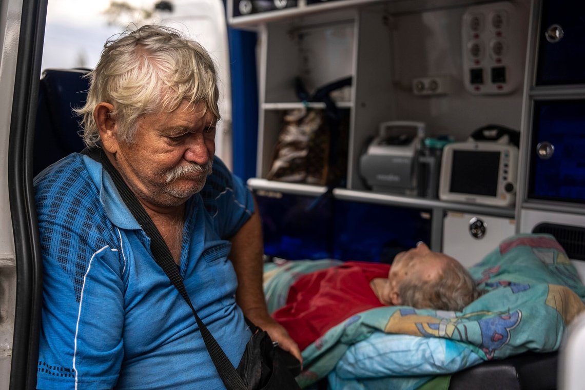 Myrola Puzyk, 70, who lost his wife Tetiana Puzyk, 68, who was killed while she was receiving her pension in the village of Yarova during a Russian aerial strike, seats in the ambulance during evacuation in Sloviansk, Donetsk region, Tuesday, Sept.9, 2025. (AP Photo/Alex Babenko) Myrola Puzyk, 70, who lost his wife Tetiana Puzyk, 68, who was killed while she was receiving her pension in the village of Yarova during a Russian aerial strike, seats in the ambulance during evacuation in Sloviansk, Donetsk region, Tuesday, Sept.9, 2025. (AP Photo/Alex Babenko)