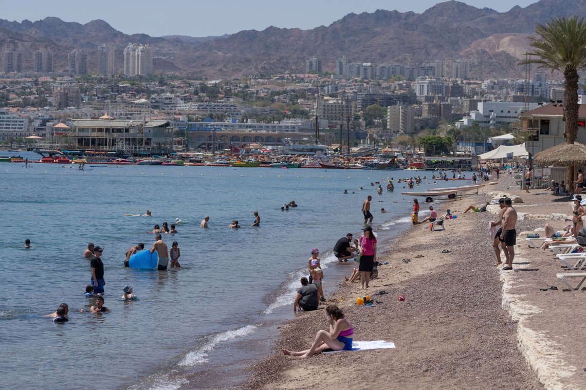 People bathe on the beach of Eilat, Israel, Tuesday, April 16, 2024. (AP Photo/Ohad Zwigenberg) People bathe on the beach of Eilat, Israel, Tuesday, April 16, 2024. (AP Photo/Ohad Zwigenberg)