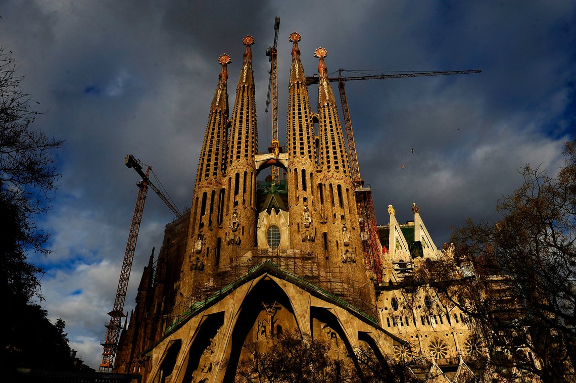 FILE - In this file photo taken Jan. 13, 2010 shows Antoni Gaudi's Sagrada Familia church, an unfinished Barcelona landmark in Barcelona, Spain. An official building permit has been issued for the unfinished Barcelona church designed by architect Antoni Gaudí 137 years after construction started on La Sagrada Familia Basilica. Barcelona City Hall says it granted the current builders a permit valid through 2026. The basilica's first stone was laid in 1882, but the city says there is was no record a construction license ever was granted. (AP Photo/Manu Fernandez, File) FILE - In this file photo taken Jan. 13, 2010 shows Antoni Gaudi's Sagrada Familia church, an unfinished Barcelona landmark in Barcelona, Spain. An official building permit has been issued for the unfinished Barcelona church designed by architect Antoni Gaudí 137 years after construction started on La Sagrada Familia Basilica. Barcelona City Hall says it granted the current builders a permit valid through 2026. The basilica's first stone was laid in 1882, but the city says there is was no record a construction license ever was granted. (AP Photo/Manu Fernandez, File)