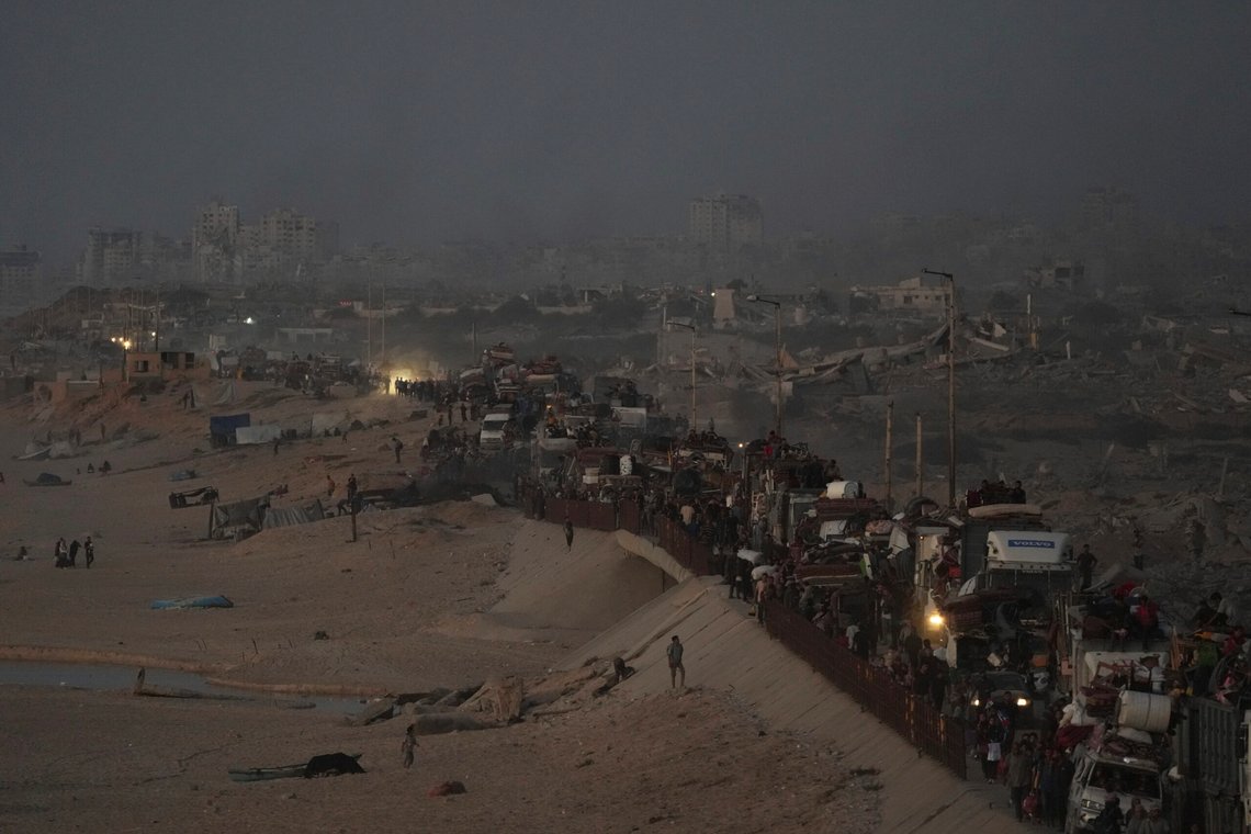 Displaced Palestinians flee Gaza City, by foot and vehicles, carrying their belongings along the coastal road in Nuseirat toward the southern Gaza Strip, Friday, Sept. 19, 2025. (AP Photo/Abdel Kareem Hana) Displaced Palestinians flee Gaza City, by foot and vehicles, carrying their belongings along the coastal road in Nuseirat toward the southern Gaza Strip, Friday, Sept. 19, 2025. (AP Photo/Abdel Kareem Hana)