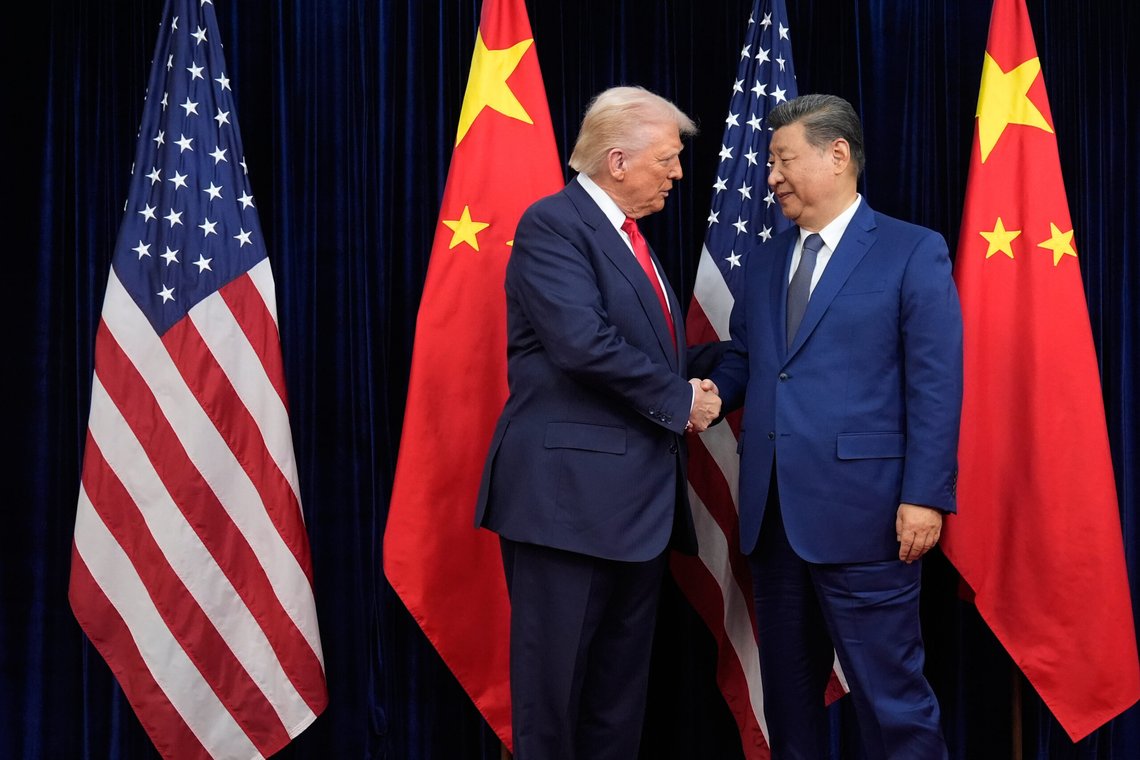 President Donald Trump, left, and Chinese President Xi Jinping shake hands before their meeting at Gimhae International Airport in Busan, South Korea, Thursday, Oct. 30, 2025. (AP Photo/Mark Schiefelbein) President Donald Trump, left, and Chinese President Xi Jinping shake hands before their meeting at Gimhae International Airport in Busan, South Korea, Thursday, Oct. 30, 2025. (AP Photo/Mark Schiefelbein)