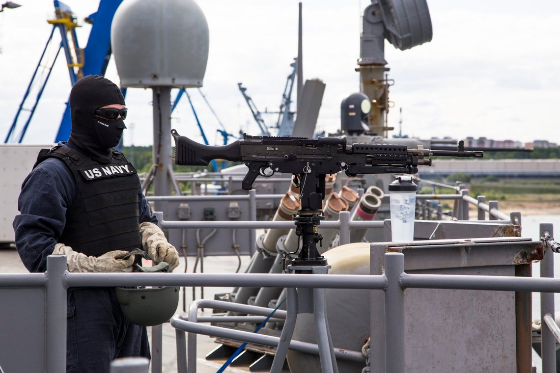 In this photo taken Sunday, June 5, 2016 security personnel of the US Navy guard USS Carter Hall keep watch during the multinational BALTOPS naval exercise on the Baltic Sea near Muuga, Estonia. Over 200 U.S. Marines are wrapping up Wednesday the first ever NATO amphibious landing exercise to nonmember Finland as a part of the multinational BALTOPS naval exercise on the Baltic Sea. (AP Photo/Jari Tanner) In this photo taken Sunday, June 5, 2016 security personnel of the US Navy guard USS Carter Hall keep watch during the multinational BALTOPS naval exercise on the Baltic Sea near Muuga, Estonia. Over 200 U.S. Marines are wrapping up Wednesday the first ever NATO amphibious landing exercise to nonmember Finland as a part of the multinational BALTOPS naval exercise on the Baltic Sea. (AP Photo/Jari Tanner)
