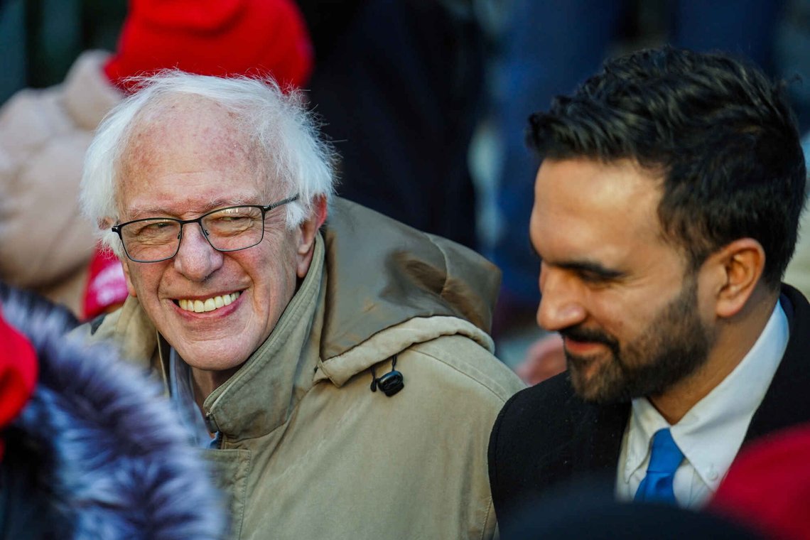 Mayor Zohran Mamdani and Senator Bernie Sanders (I-VT), speak in front of members of the New York State Nurses Association union during a picket outside Mount Sinai West Hospital, Tuesday, Jan. 20, 2026, in New York. (AP Photo/Ryan Murphy) Mayor Zohran Mamdani and Senator Bernie Sanders (I-VT), speak in front of members of the New York State Nurses Association union during a picket outside Mount Sinai West Hospital, Tuesday, Jan. 20, 2026, in New York. (AP Photo/Ryan Murphy)