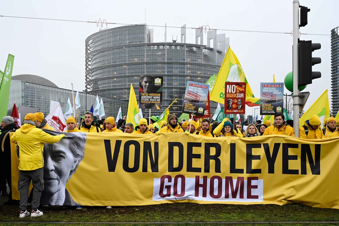 Farmers protest, as they stand in front of a banner of European Commission President Ursula von der Leyen, during a demonstration against the EU-Mercusor trade agreement outside the European Parliament in Strasbourg, eastern France, Tuesday, Jan. 20, 2026. (AP Photo/Pascal Bastien) Farmers protest, as they stand in front of a banner of European Commission President Ursula von der Leyen, during a demonstration against the EU-Mercusor trade agreement outside the European Parliament in Strasbourg, eastern France, Tuesday, Jan. 20, 2026. (AP Photo/Pascal Bastien)