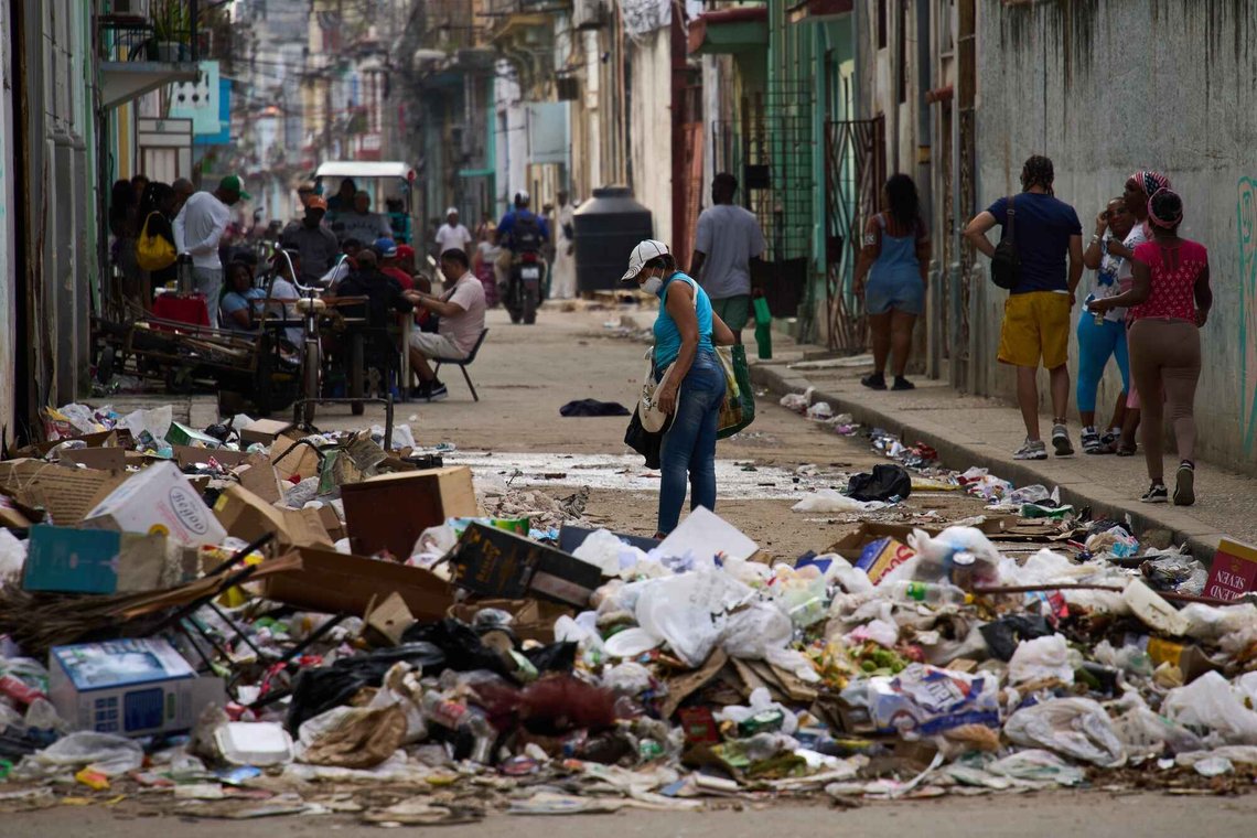Pedestrians walk past trash in Havana, Tuesday, Feb. 17, 2026. (AP Photo/Ramon Espinosa) Pedestrians walk past trash in Havana, Tuesday, Feb. 17, 2026. (AP Photo/Ramon Espinosa)