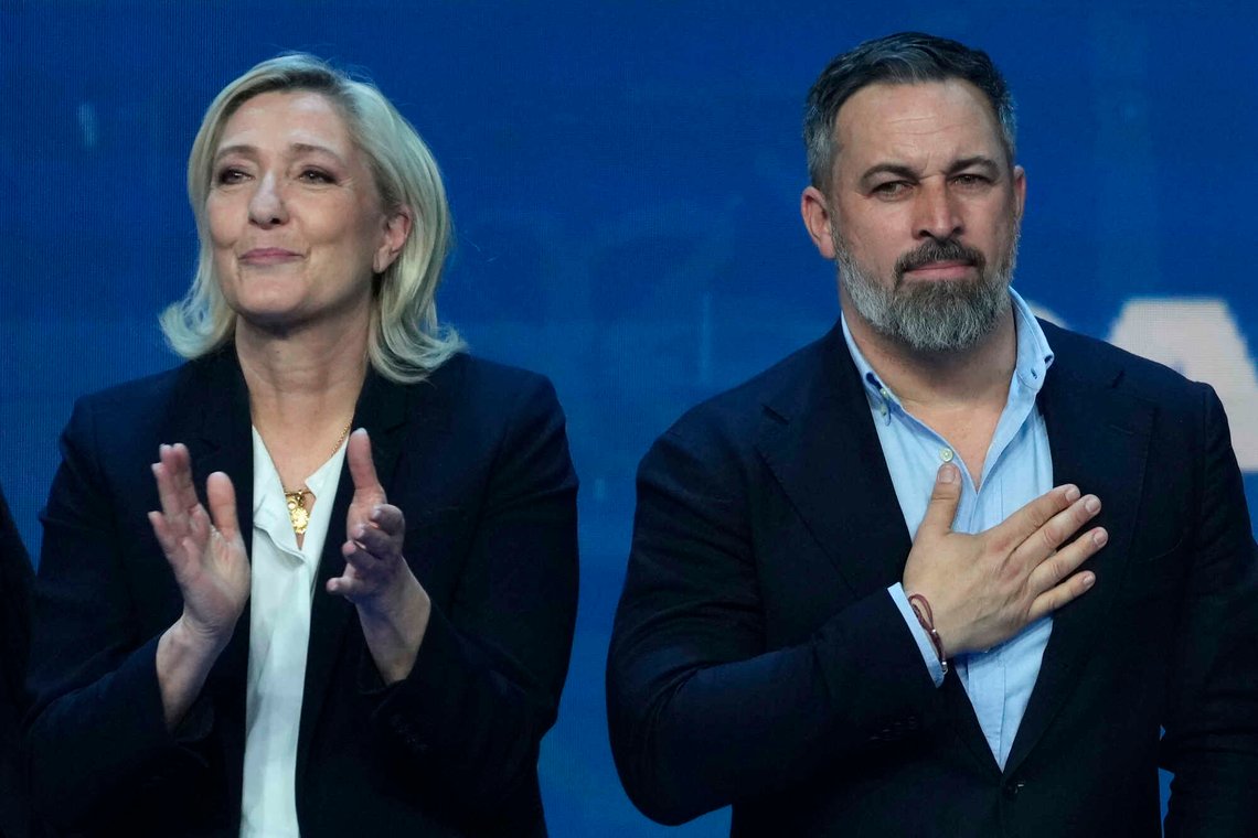 Spanish far-right VOX party leader Santiago Abascal, right, gestures while French far-right leader Marine Le Pen applauds during the far-right Patriots for Europe summit in Madrid, Spain, Saturday, Feb. 8, 2025. (AP Photo/Paul White) Spanish far-right VOX party leader Santiago Abascal, right, gestures while French far-right leader Marine Le Pen applauds during the far-right Patriots for Europe summit in Madrid, Spain, Saturday, Feb. 8, 2025. (AP Photo/Paul White)