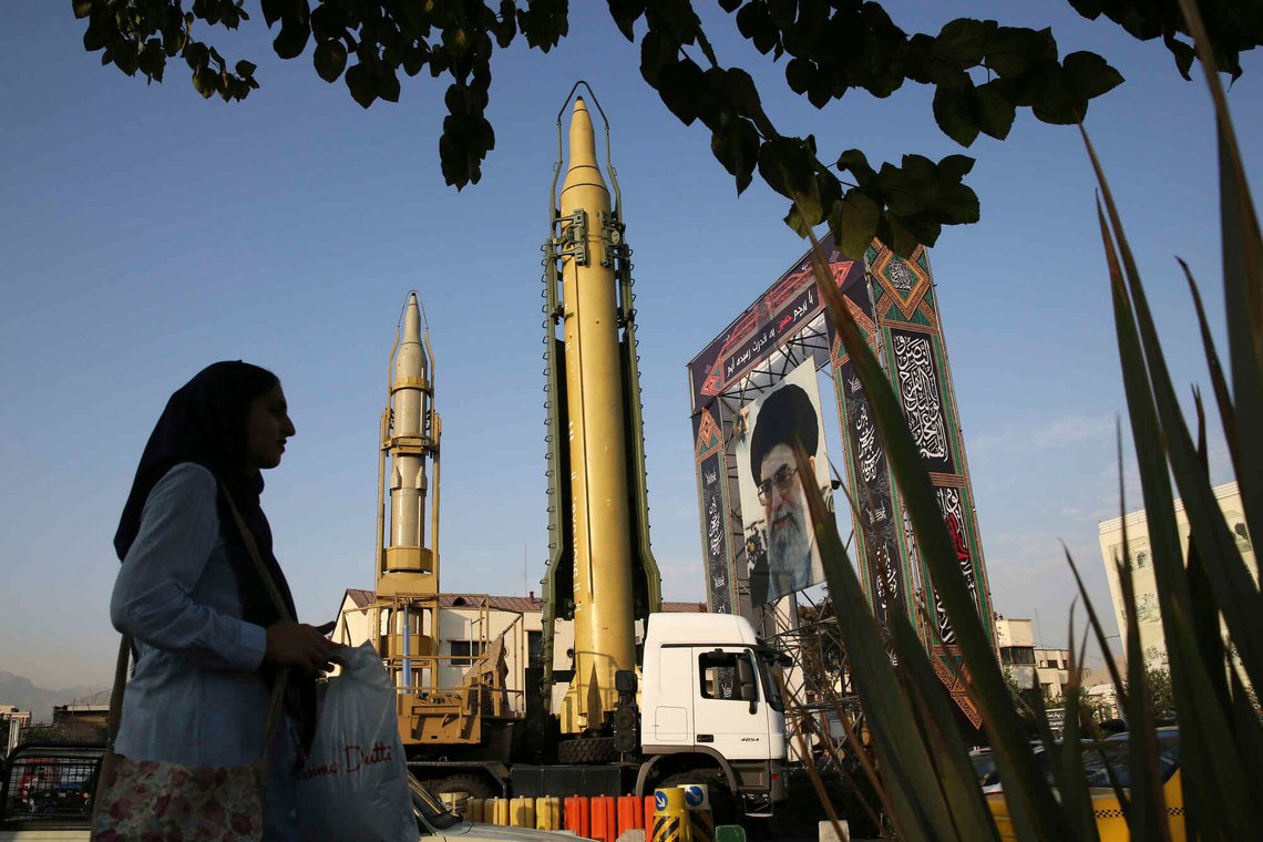 FILE - A Ghadr-H missle, center, a solid-fuel surface-to-surface Sejjil missile and a portrait of the Supreme Leader Ayatollah Ali Khamenei are on display for the annual Defense Week, marking the 37th anniversary of the 1980s Iran-Iraq war, at Baharestan Sq. in Tehran, Iran, Sept. 24, 2017. Iranian state television said Sunday, June 26, 2022, that Tehran had launched a solid-fueled rocket into space, drawing a rebuke from Washington ahead of the expected resumption of stalled talks over Tehran’s tattered nuclear deal with world powers. (AP Photo/Vahid Salemi, File) FILE - A Ghadr-H missle, center, a solid-fuel surface-to-surface Sejjil missile and a portrait of the Supreme Leader Ayatollah Ali Khamenei are on display for the annual Defense Week, marking the 37th anniversary of the 1980s Iran-Iraq war, at Baharestan Sq. in Tehran, Iran, Sept. 24, 2017. Iranian state television said Sunday, June 26, 2022, that Tehran had launched a solid-fueled rocket into space, drawing a rebuke from Washington ahead of the expected resumption of stalled talks over Tehran’s tattered nuclear deal with world powers. (AP Photo/Vahid Salemi, File)