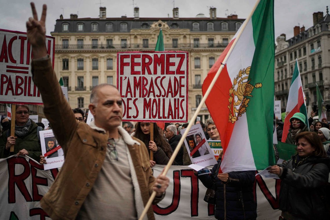 People demonstrate in Lyon, central France, Sunday, Jan. 8, 2023. Hundreds of people marched Sunday in France to honor an Iranian Kurdish man who took his own life in a desperate act of anguish over the nationwide protests in Iran. Police estimated the size of the crowd that gathered for Mohammad Moradi at about 1,000 people. They marched in the city of Lyon, where the 38-year-old Moradi took his own life in December, drowning in the Rhone river. (AP Photo/Laurent Cipriani) People demonstrate in Lyon, central France, Sunday, Jan. 8, 2023. Hundreds of people marched Sunday in France to honor an Iranian Kurdish man who took his own life in a desperate act of anguish over the nationwide protests in Iran. Police estimated the size of the crowd that gathered for Mohammad Moradi at about 1,000 people. They marched in the city of Lyon, where the 38-year-old Moradi took his own life in December, drowning in the Rhone river. (AP Photo/Laurent Cipriani)