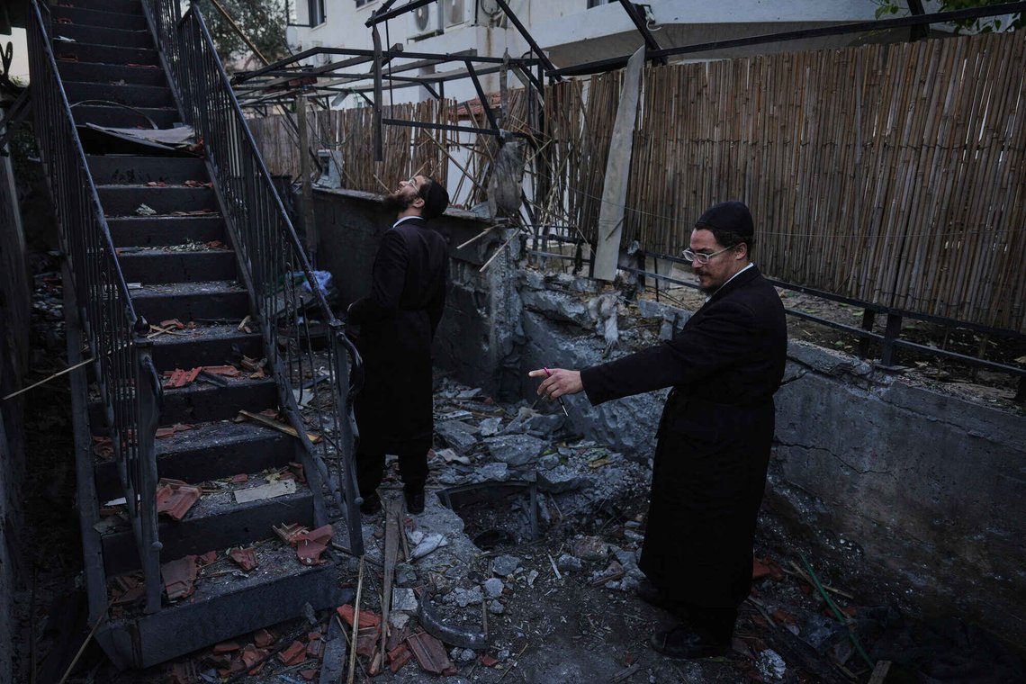 Residents inspect a damaged house struck by a rocket fired from Lebanon, in Hatzor HaGlilit, northern Israel, Wednesday, March 4, 2026. (AP Photo/Ariel Schalit) Residents inspect a damaged house struck by a rocket fired from Lebanon, in Hatzor HaGlilit, northern Israel, Wednesday, March 4, 2026. (AP Photo/Ariel Schalit)