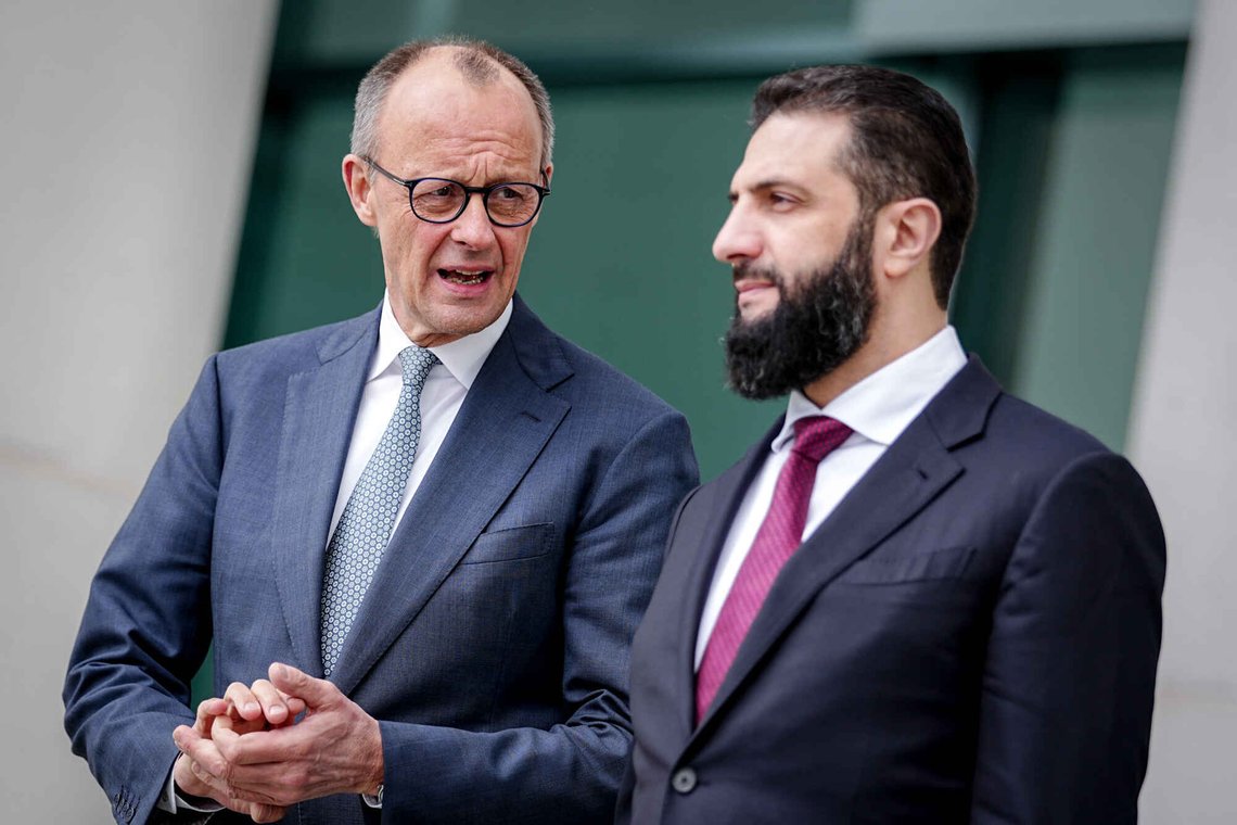 German Chancellor Friedrich Merz, left, receives President of the Syrian transitional government Ahmed al-Sharaa, at the Federal Chancellery in Berlin, Germany, Monday, March 30, 2026. (Kay Nietfeld/dpa via AP) German Chancellor Friedrich Merz, left, receives President of the Syrian transitional government Ahmed al-Sharaa, at the Federal Chancellery in Berlin, Germany, Monday, March 30, 2026. (Kay Nietfeld/dpa via AP)