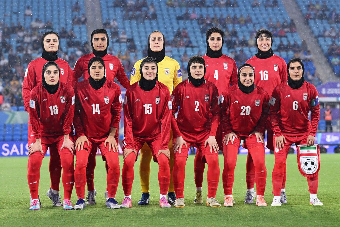 FILE - Iran players pose for a team photo ahead of the Women's Asian Cup soccer match between Iran and the Philippines in Robina, Australia, Sunday, March 8, 2026. (Dave Hunt/AAPImage via AP,File) FILE - Iran players pose for a team photo ahead of the Women's Asian Cup soccer match between Iran and the Philippines in Robina, Australia, Sunday, March 8, 2026. (Dave Hunt/AAPImage via AP,File)