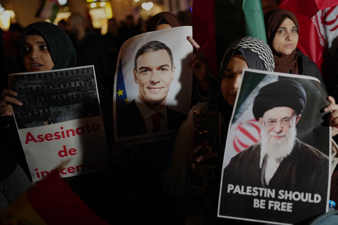 Demonstrators hold photographs of Spanish Prime Minister Pedro Sanchez during a protest against U.S. and Israeli intervention in Iran in Barcelona, Spain, Wednesday, March 4, 2026. (AP Photo) Demonstrators hold photographs of Spanish Prime Minister Pedro Sanchez during a protest against U.S. and Israeli intervention in Iran in Barcelona, Spain, Wednesday, March 4, 2026. (AP Photo)