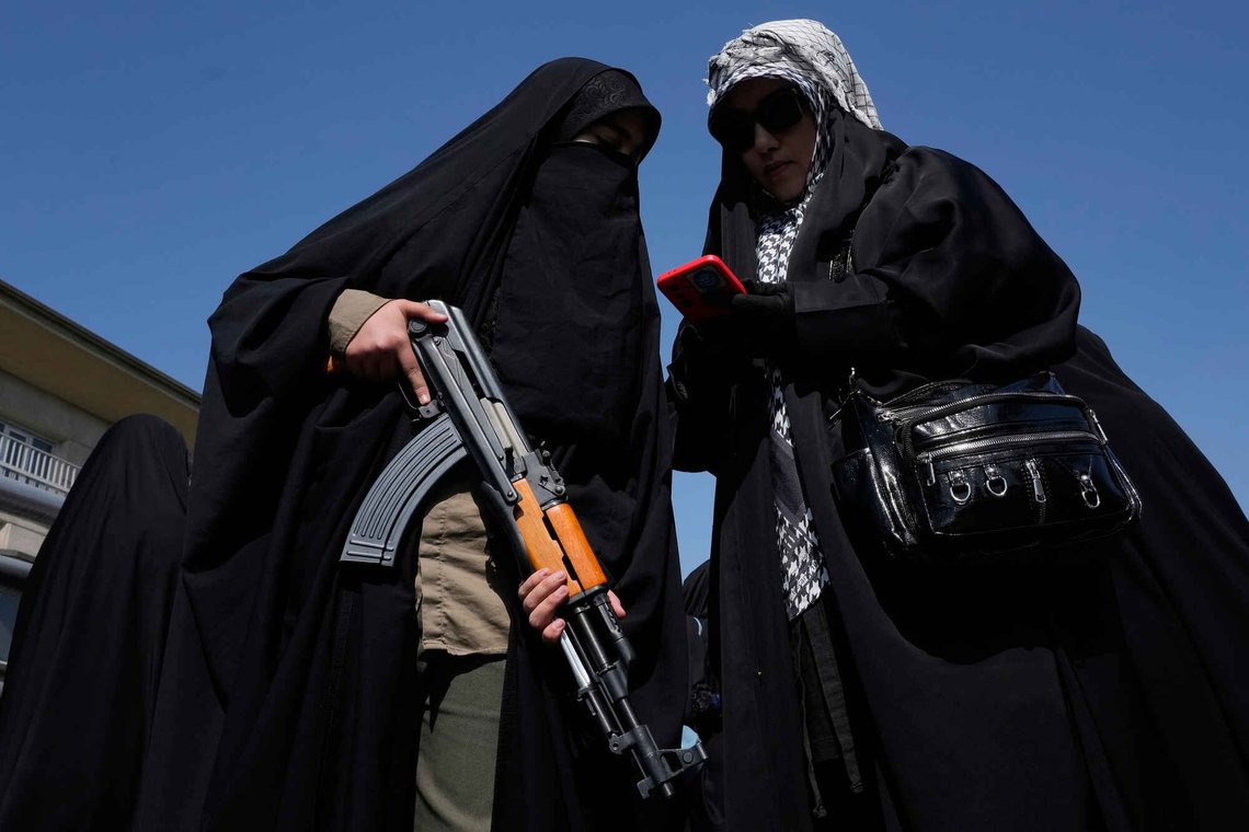 A woman member of the Basij paramilitary, affiliated with Iran's Revolutionary Guard, holds her gun during a state-organized rally in support of the supreme leader marking National Girl's Day in Tehran, Iran, Friday, April 17, 2026. (AP Photo/Vahid Salemi) A woman member of the Basij paramilitary, affiliated with Iran's Revolutionary Guard, holds her gun during a state-organized rally in support of the supreme leader marking National Girl's Day in Tehran, Iran, Friday, April 17, 2026. (AP Photo/Vahid Salemi)