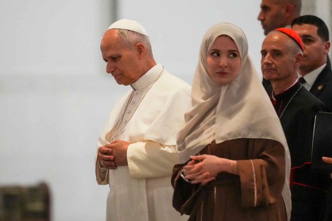 Pope Leo XIV, left, arrives at the Great Mosque in Algiers, Monday, April 13, 2026, on the first day of an 11-day apostolic journey to Africa. (AP Photo/Andrew Medichini) Pope Leo XIV, left, arrives at the Great Mosque in Algiers, Monday, April 13, 2026, on the first day of an 11-day apostolic journey to Africa. (AP Photo/Andrew Medichini)